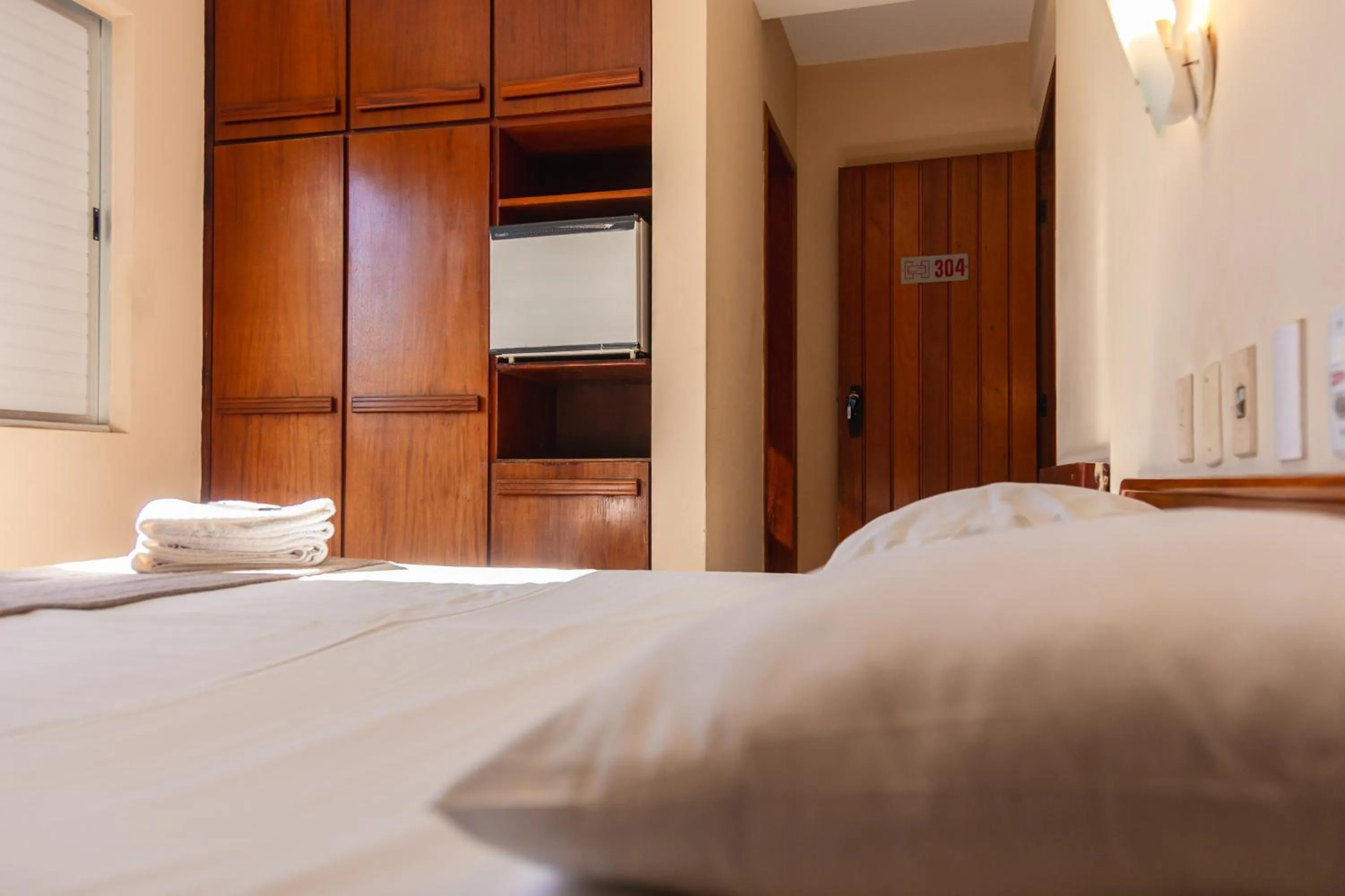 minibar, Bed in HANNA Praia Hotel - Florianópolis