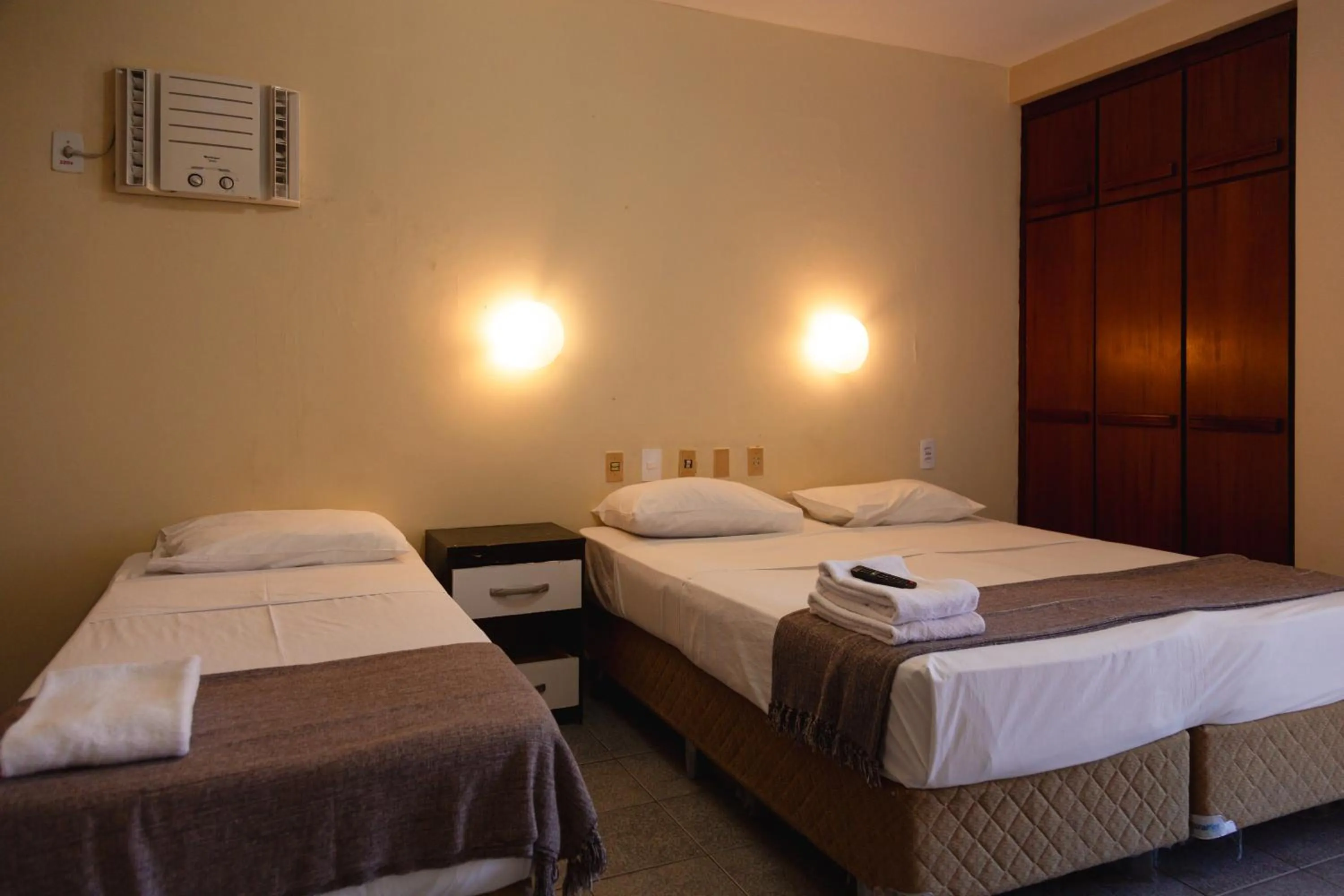 Photo of the whole room, Bed in HANNA Praia Hotel - Florianópolis