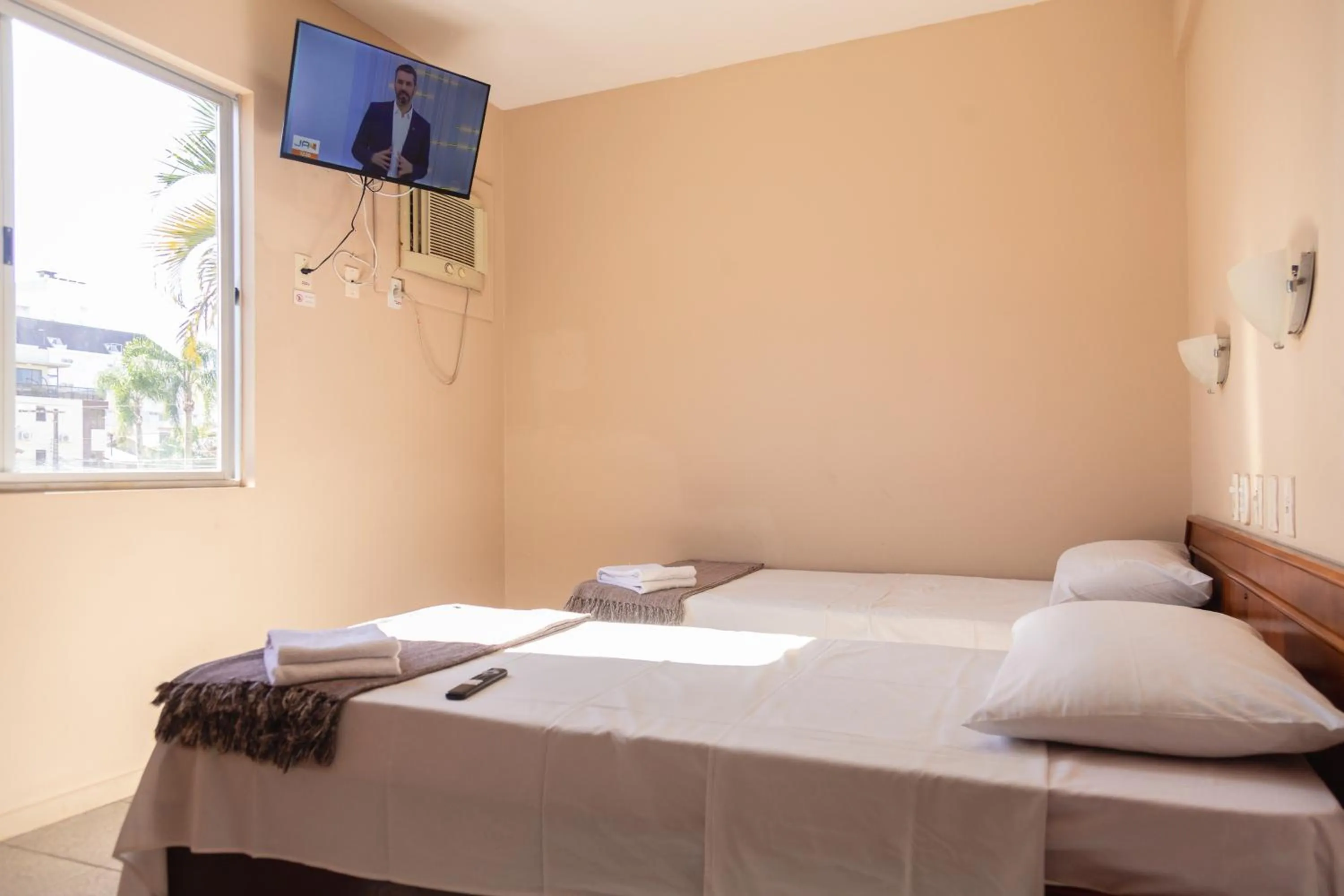 Bedroom, Bed in HANNA Praia Hotel - Florianópolis