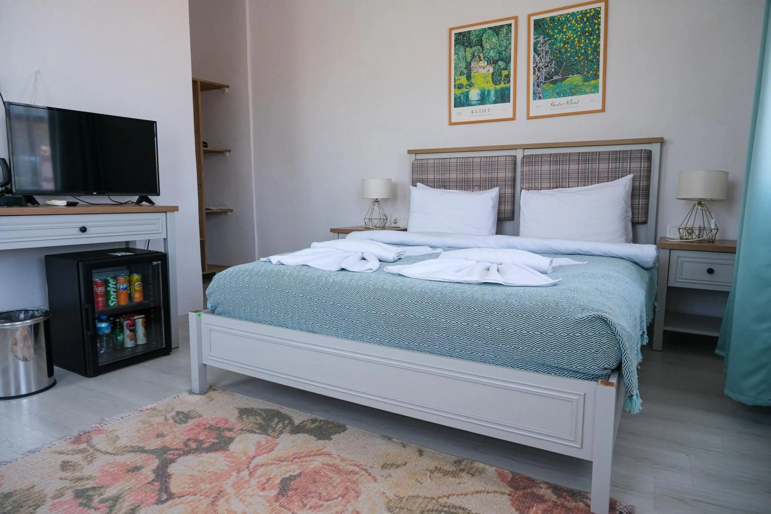 Bed in Garden Palace Boutique Hotel