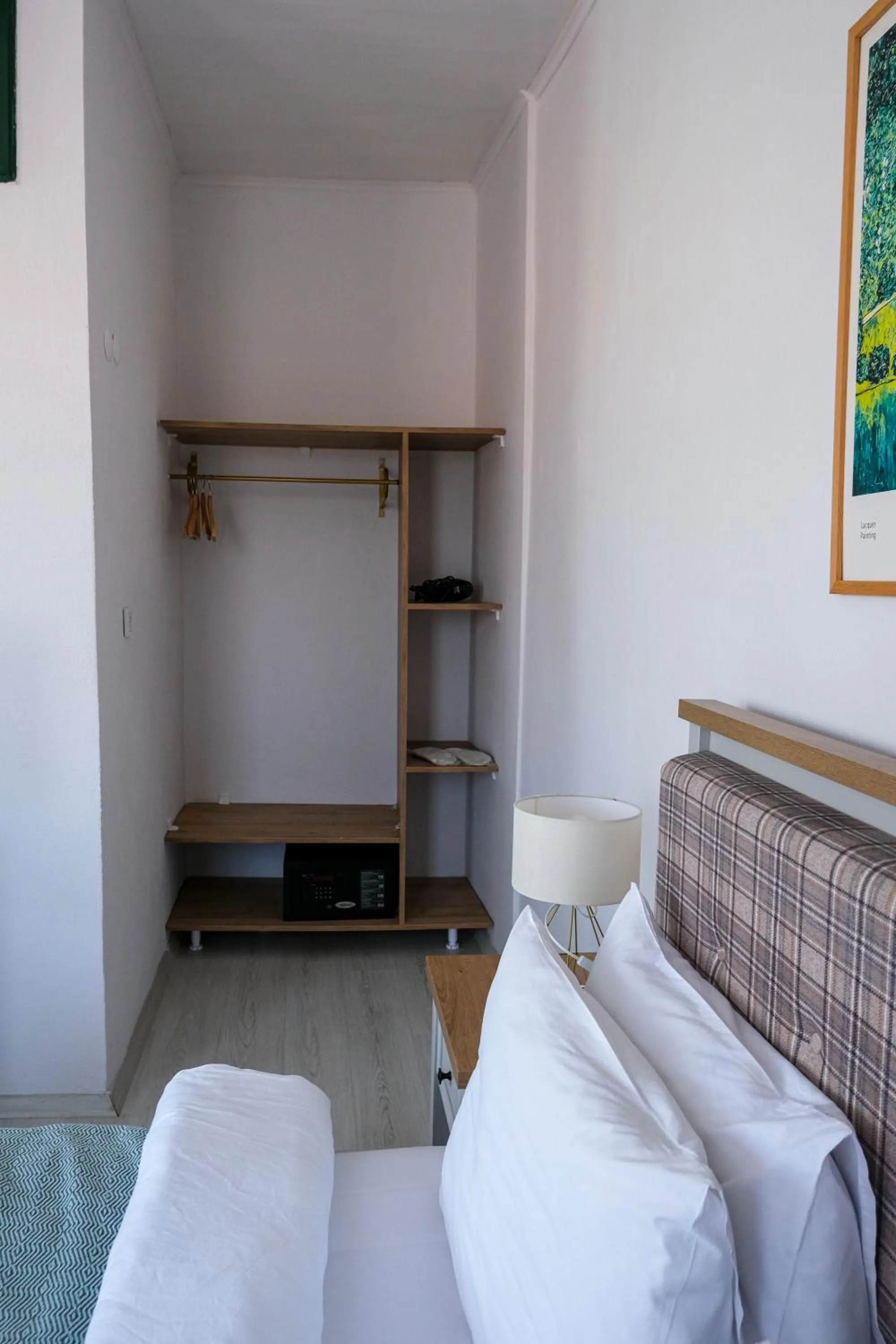 wardrobe in Garden Palace Boutique Hotel