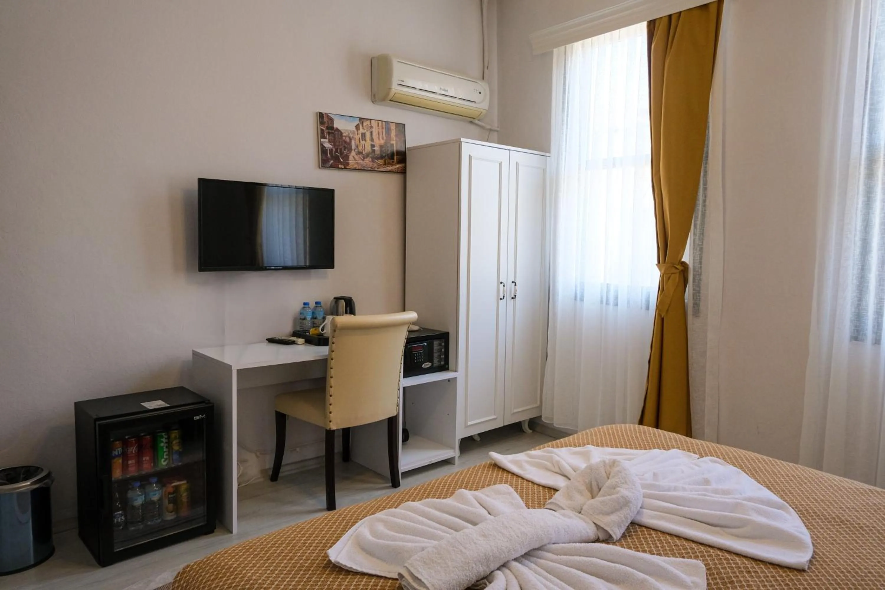 Bed in Garden Palace Boutique Hotel