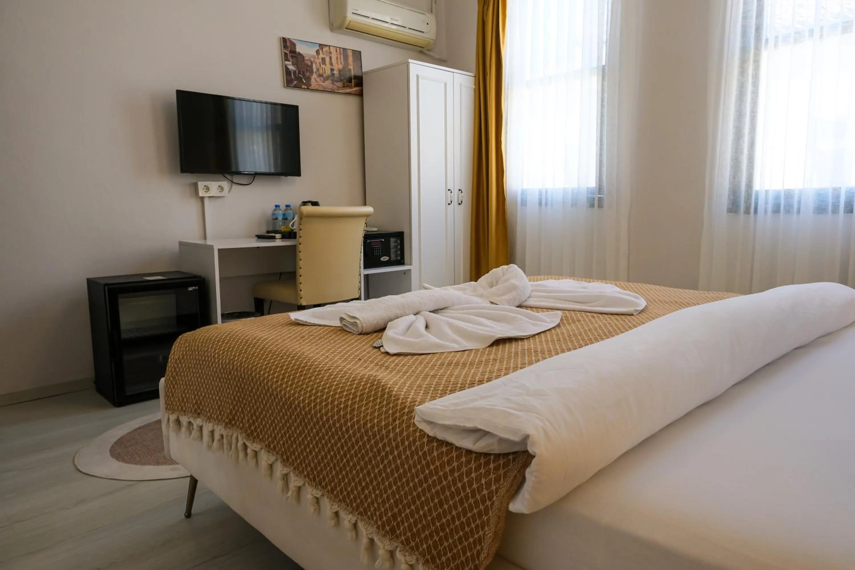 Bed in Garden Palace Boutique Hotel