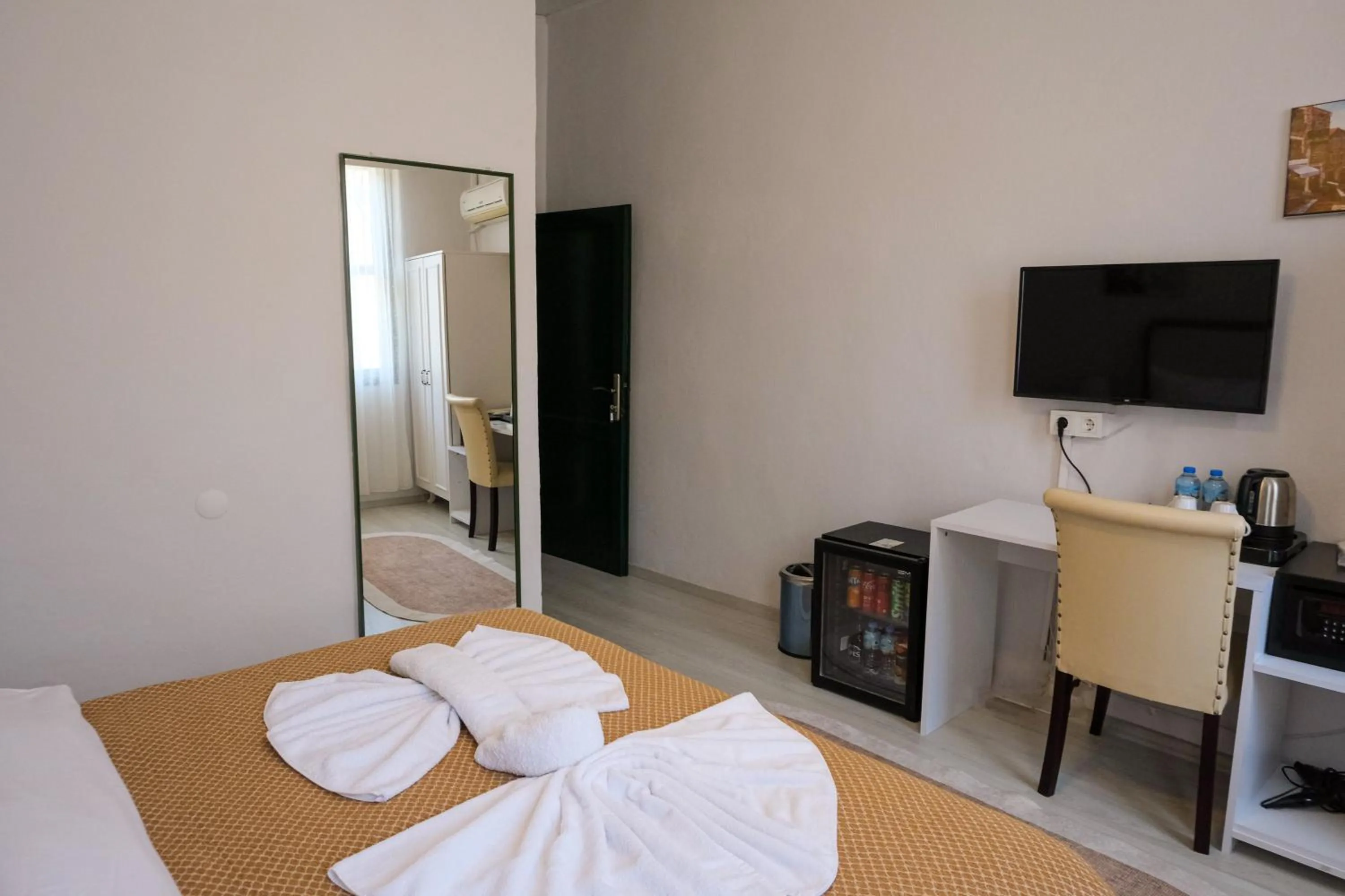 Bed in Garden Palace Boutique Hotel