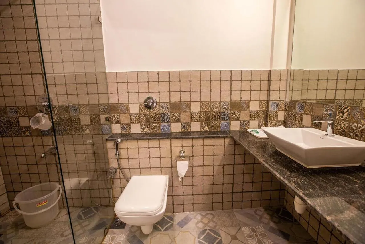 Shower in Coastal Pearl Hotel Margao Railway Station