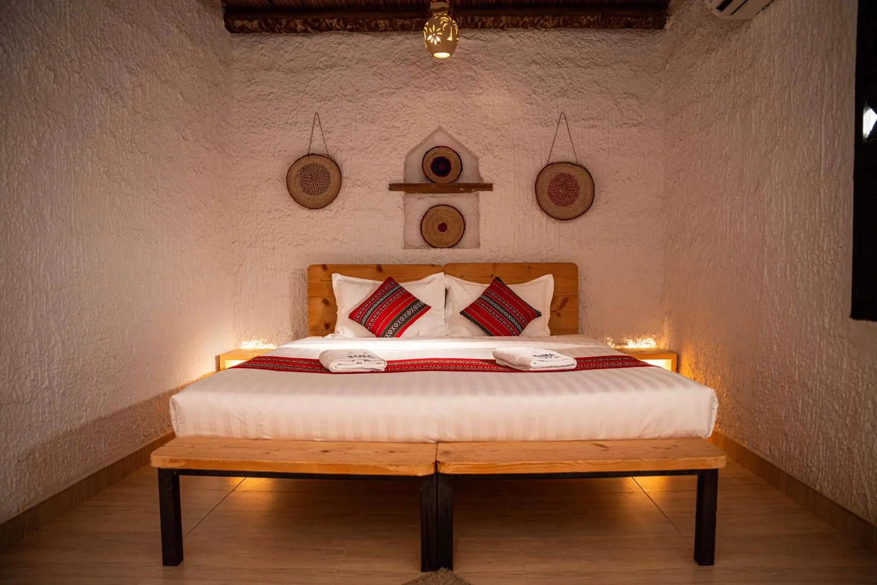 Bed in Sama al Wasil Desert Camp Bed in Sama al Wasil Desert Camp