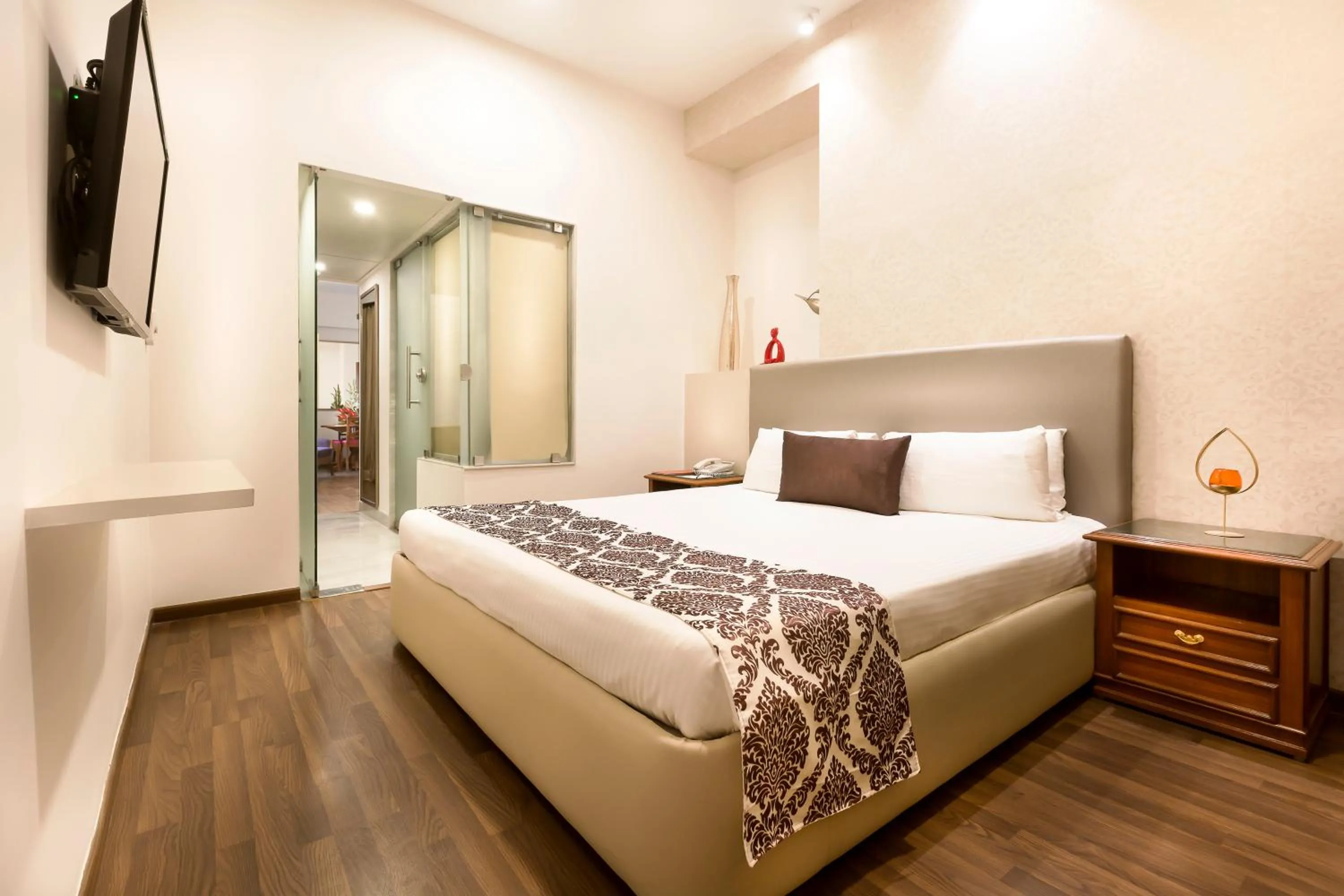 Bedroom, Bed in Regency Kanchipuram by GRT Hotels