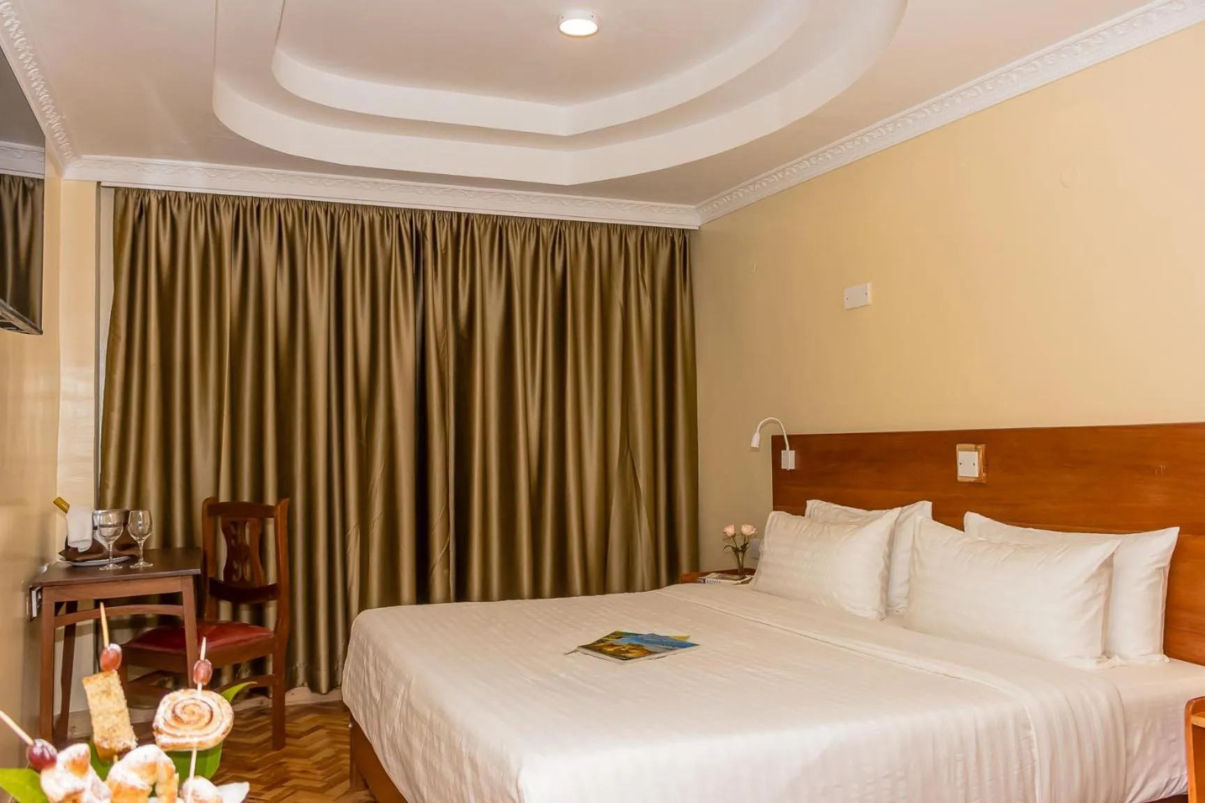 Bed in The Glacier Hotel Nanyuki