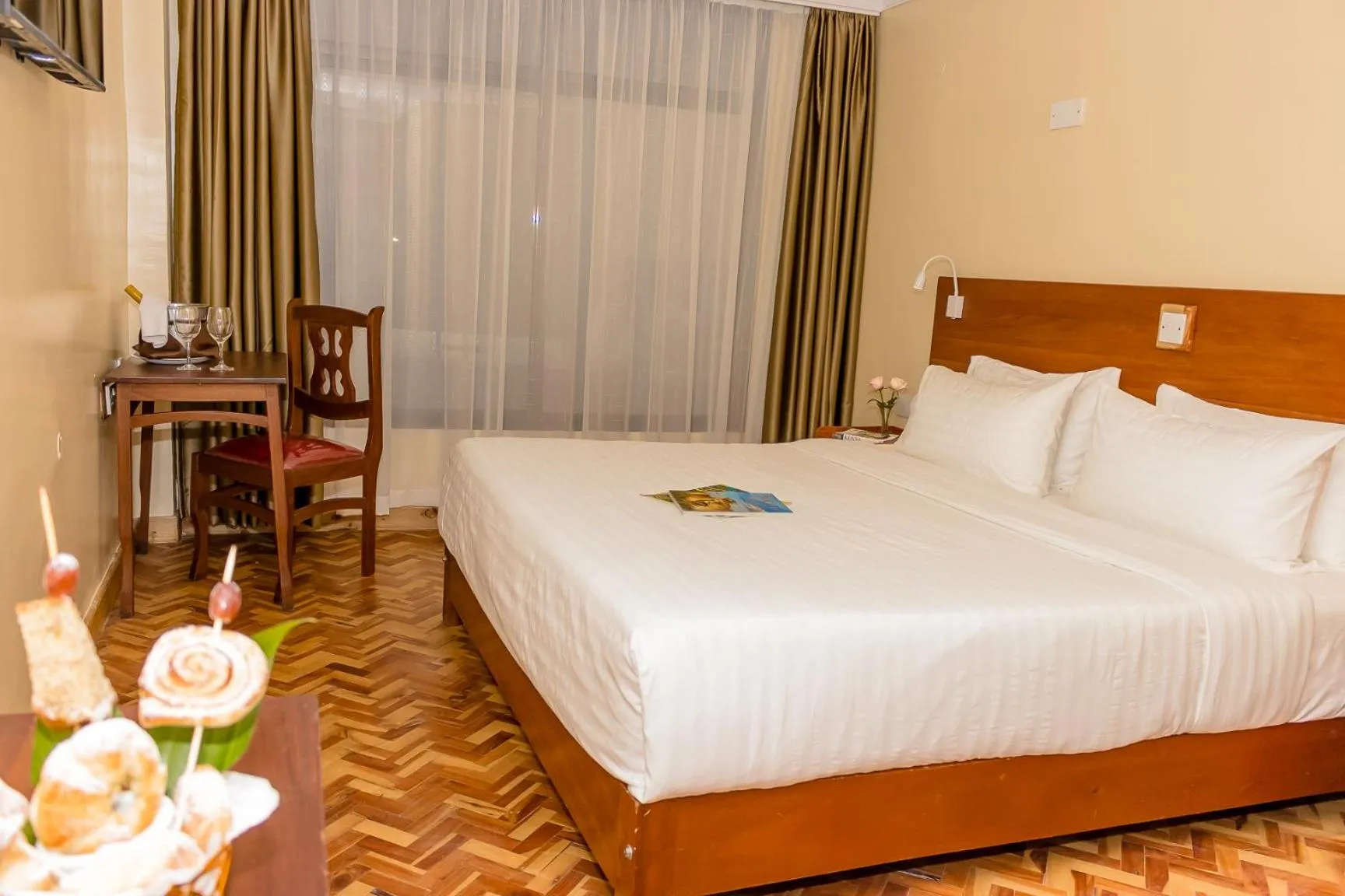 Bed in The Glacier Hotel Nanyuki