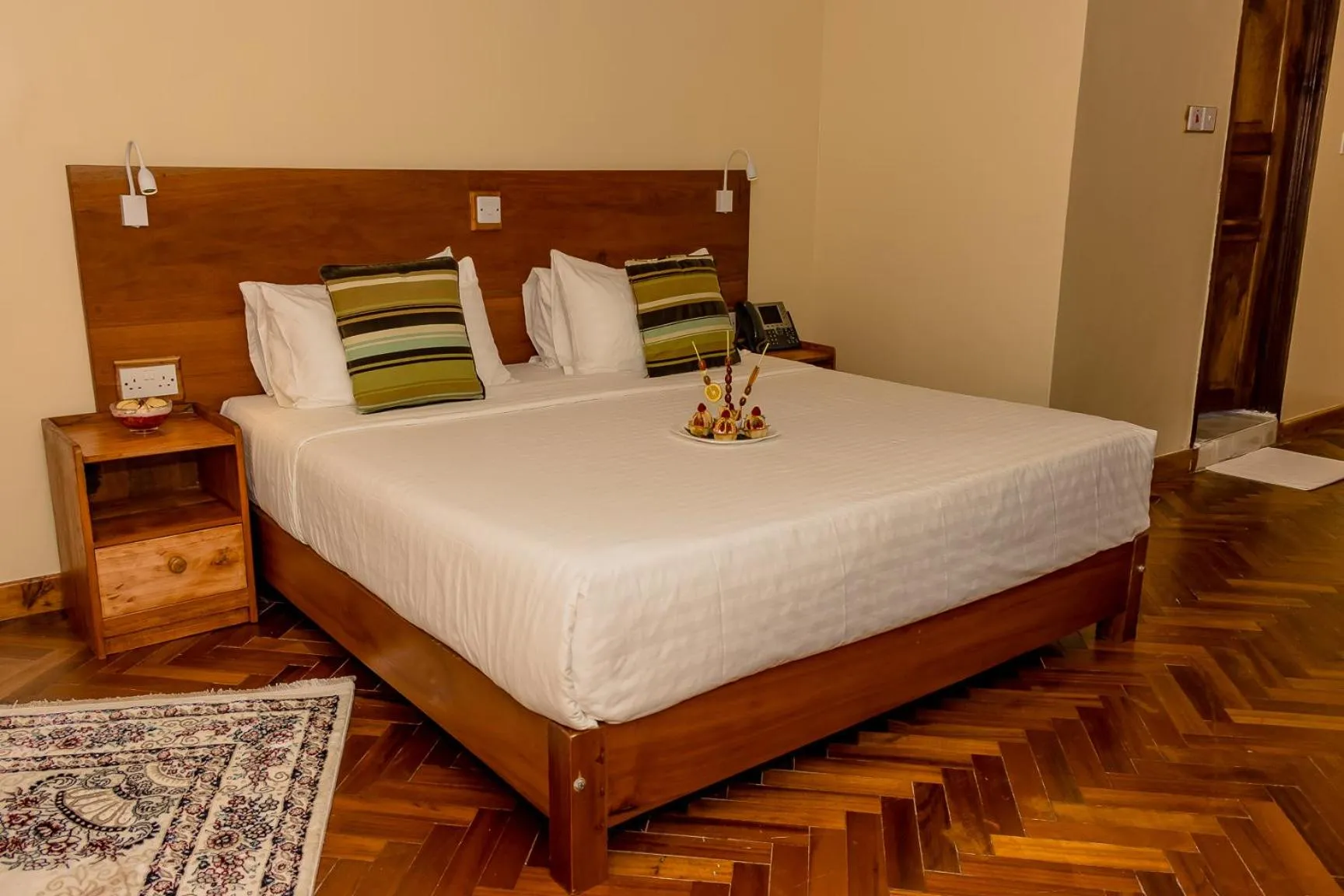 Bed in The Glacier Hotel Nanyuki