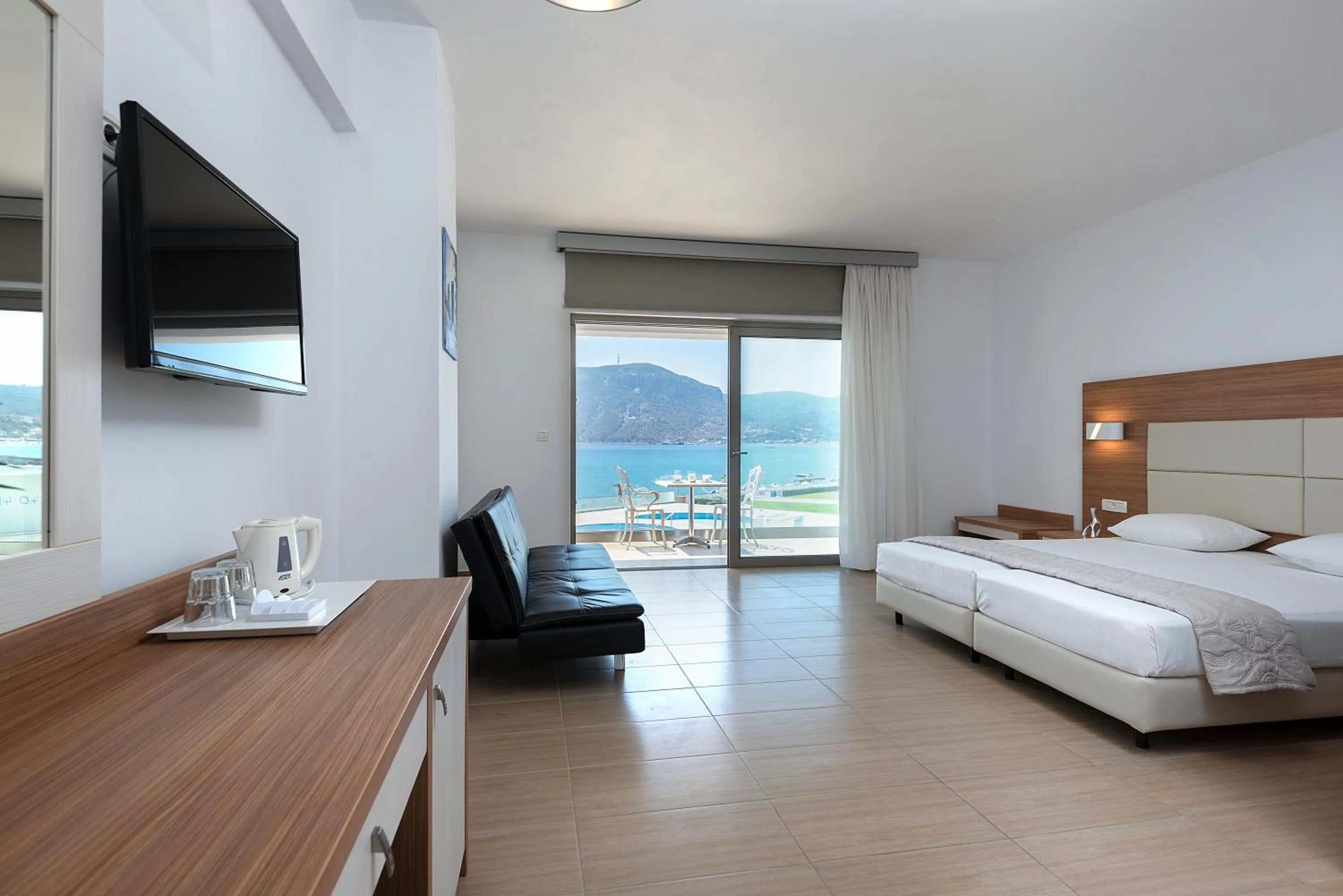 Photo of the whole room, Bed in Royal Bay Suites