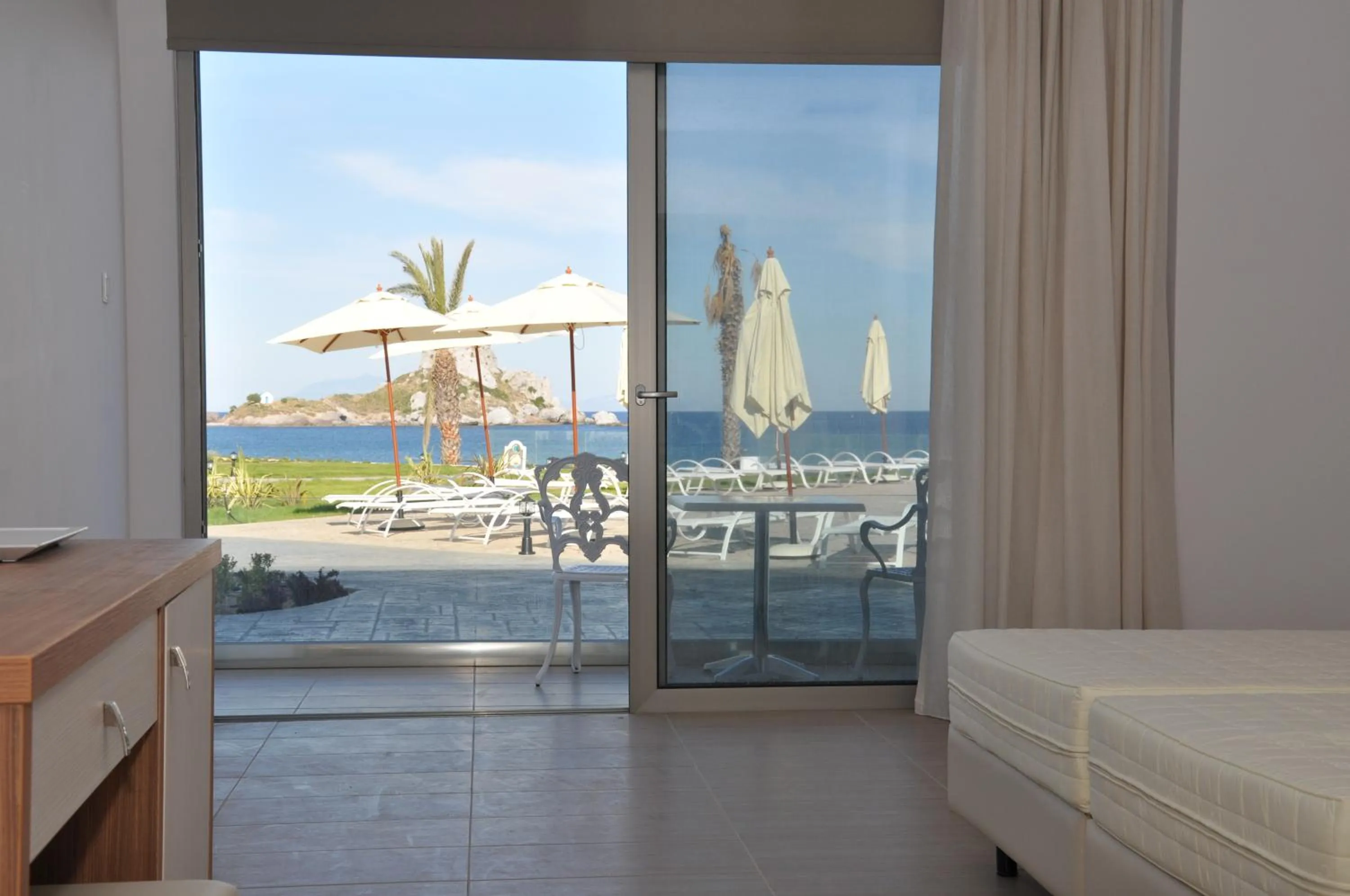 Bed in Royal Bay Suites