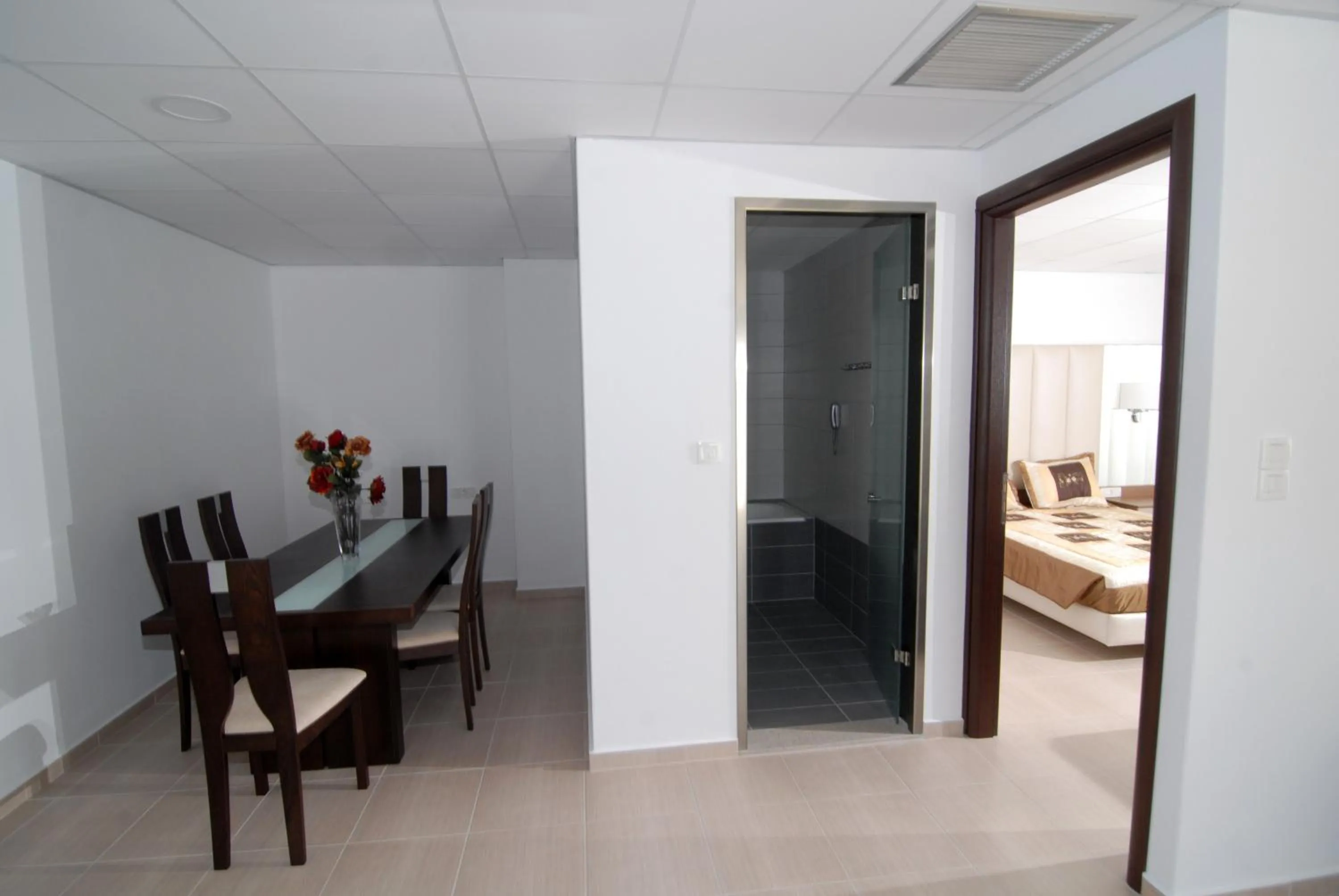 Dining area in Royal Bay Suites