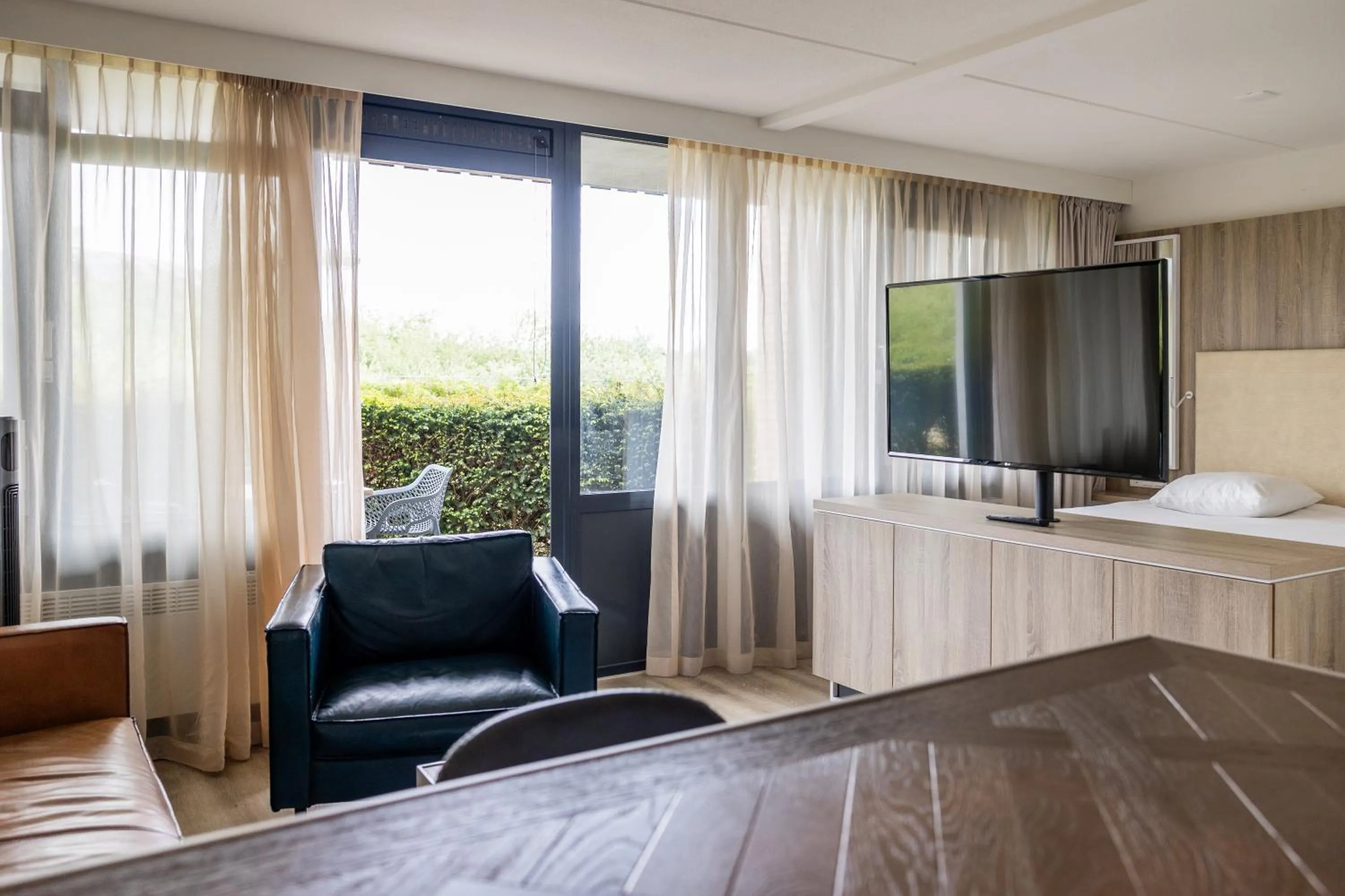 Seating area in Fletcher Hotel-Restaurant Noordsee-Ameland