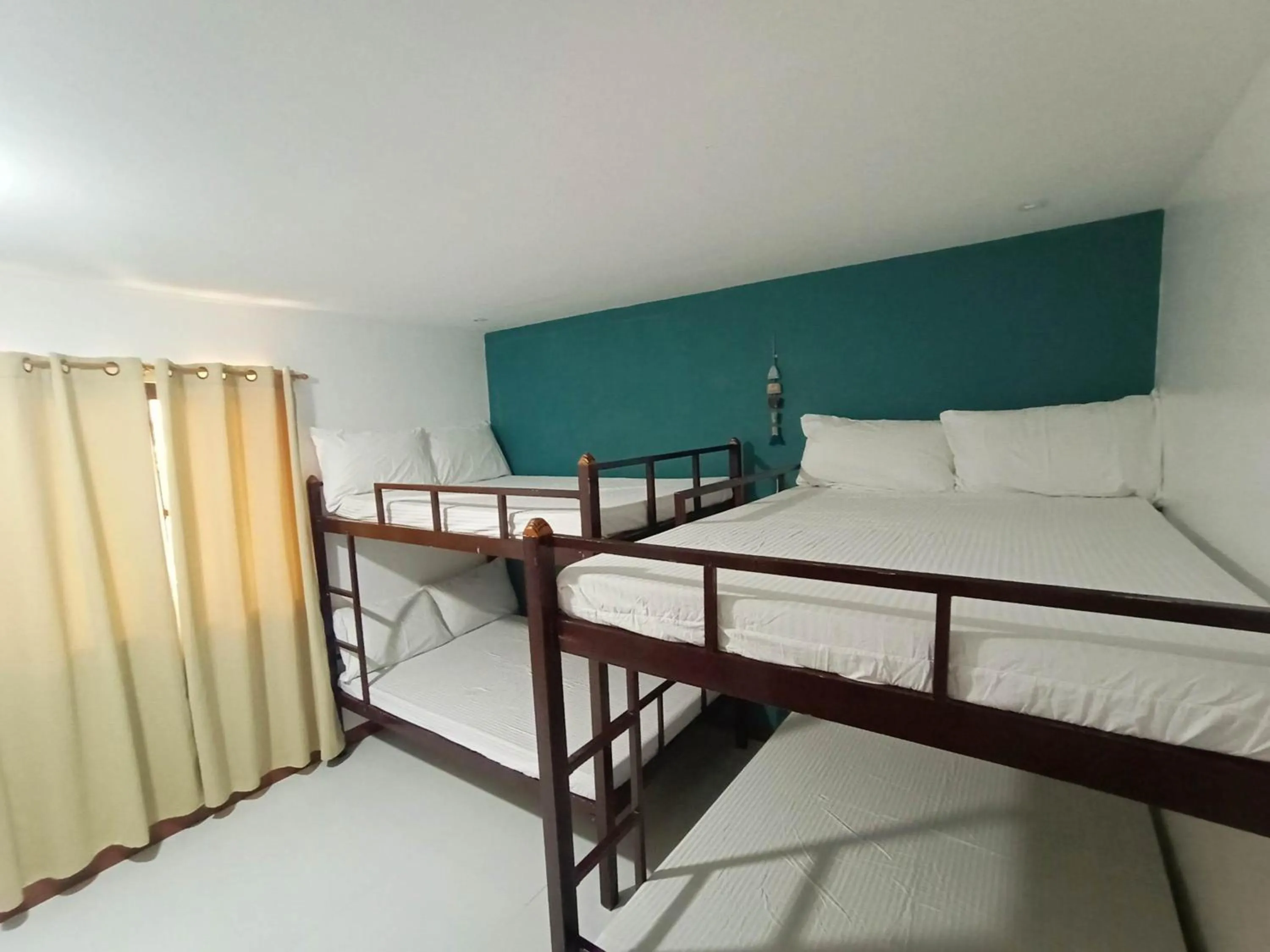 Bed in Beach Front Calatagan Apartelle
