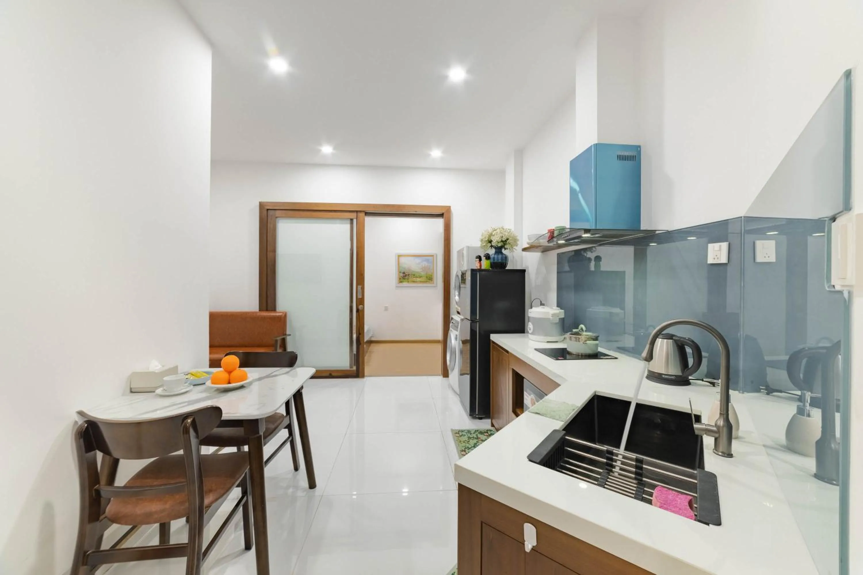 Kitchen or kitchenette in MTR Apartment & Hotel