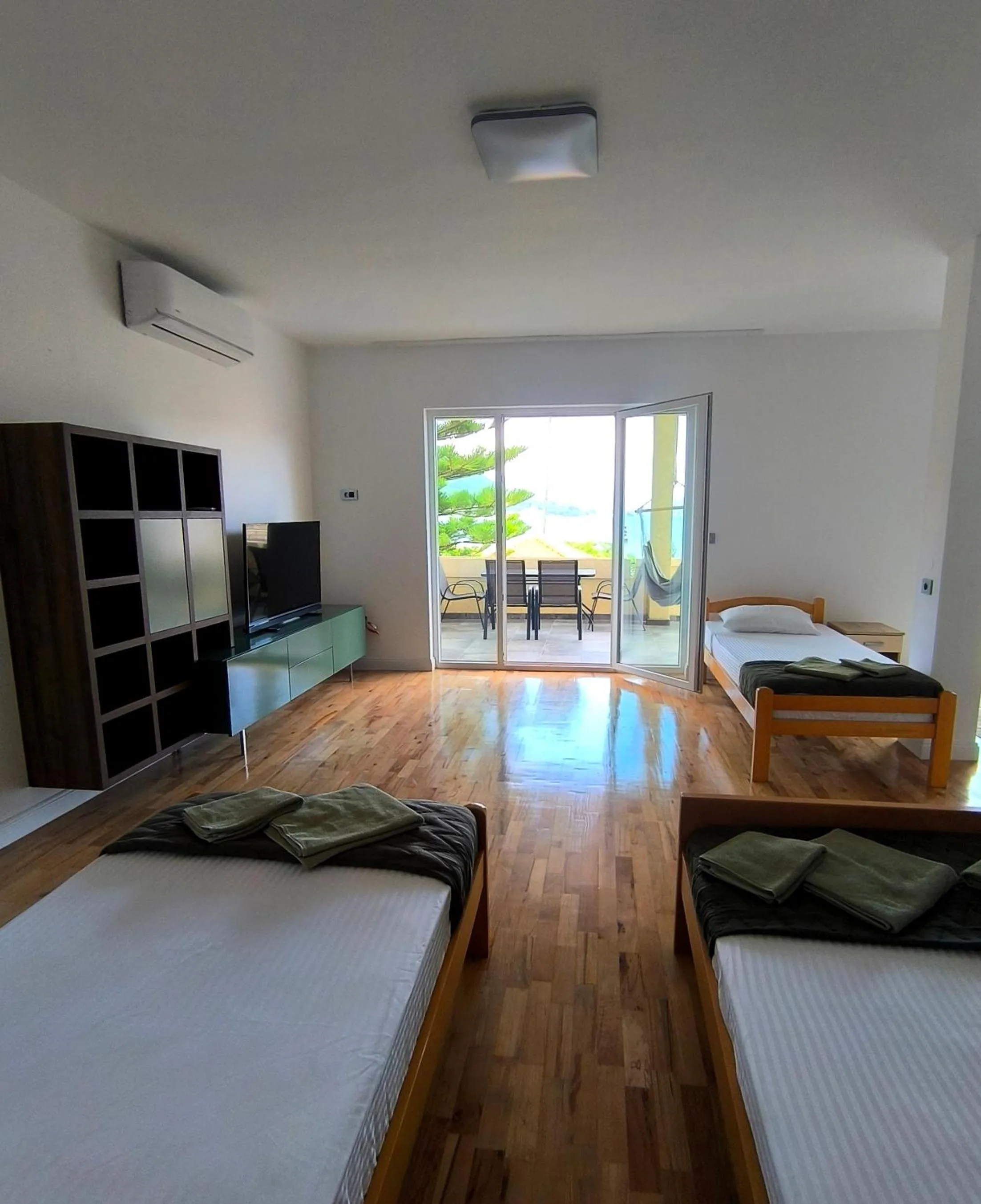 Bed in Apartments Danilo