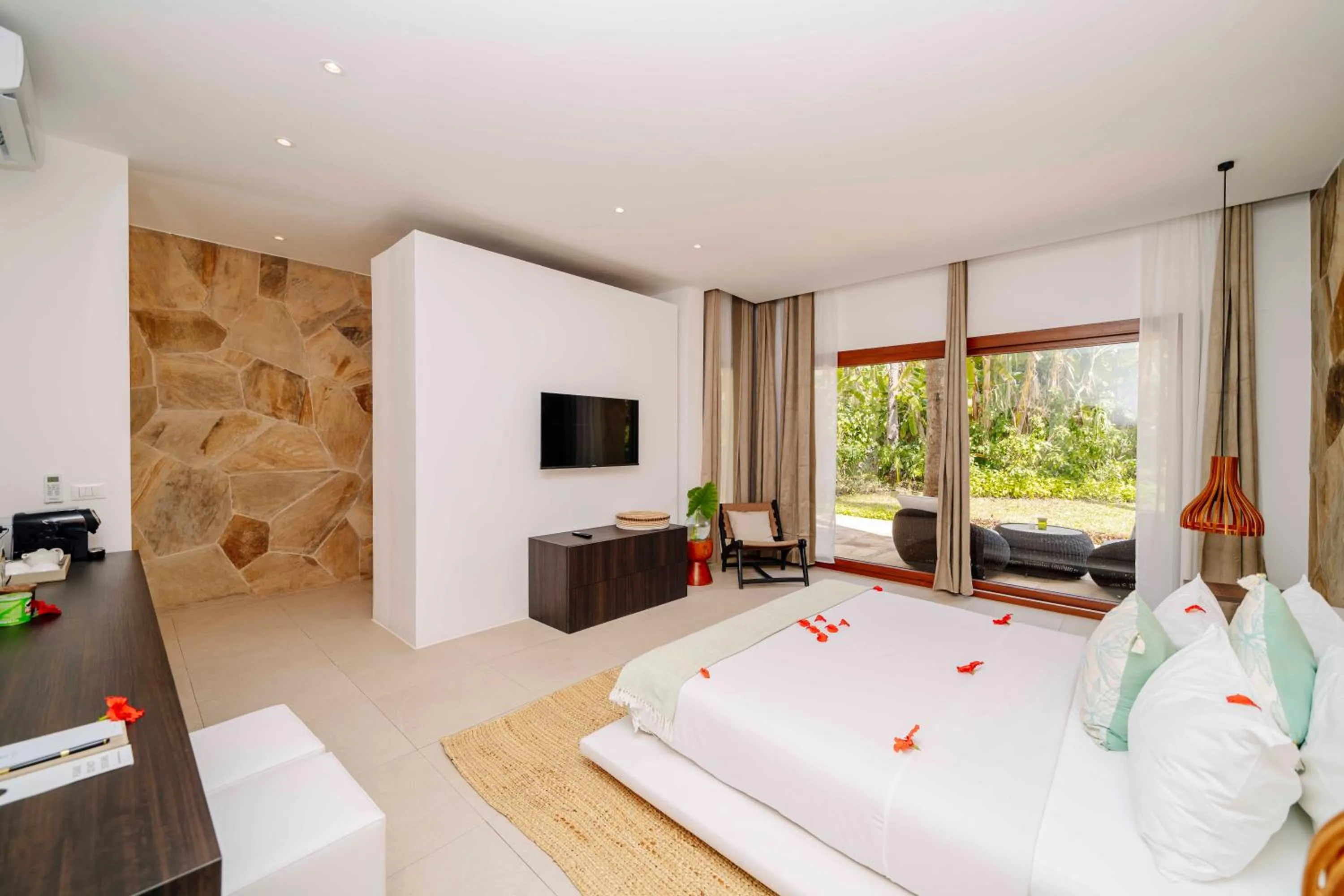 Bed in Ycona Eco-Luxury Resort, Zanzibar