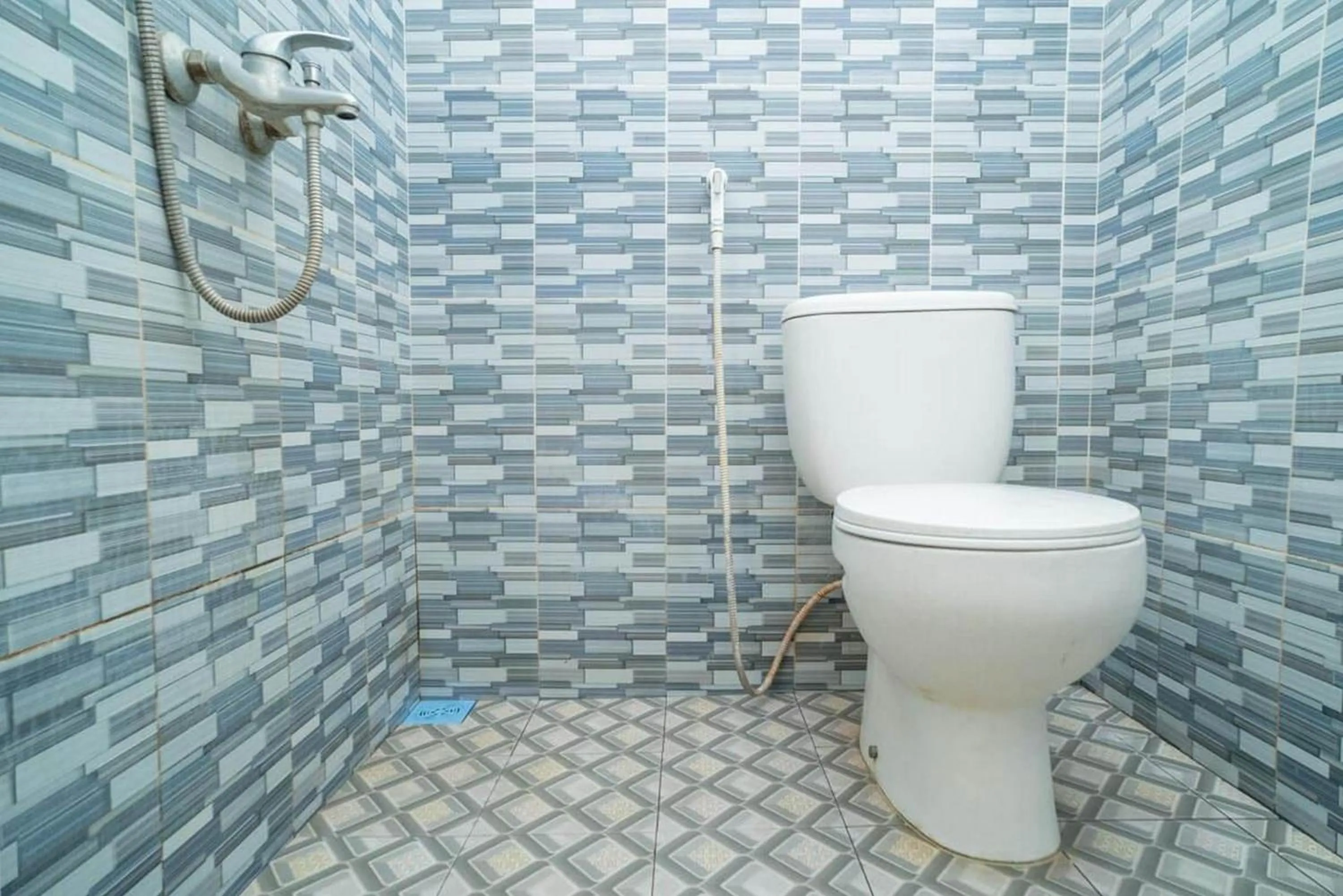 Bathroom in RedDoorz Syariah near Lippo Plaza Sidoarjo