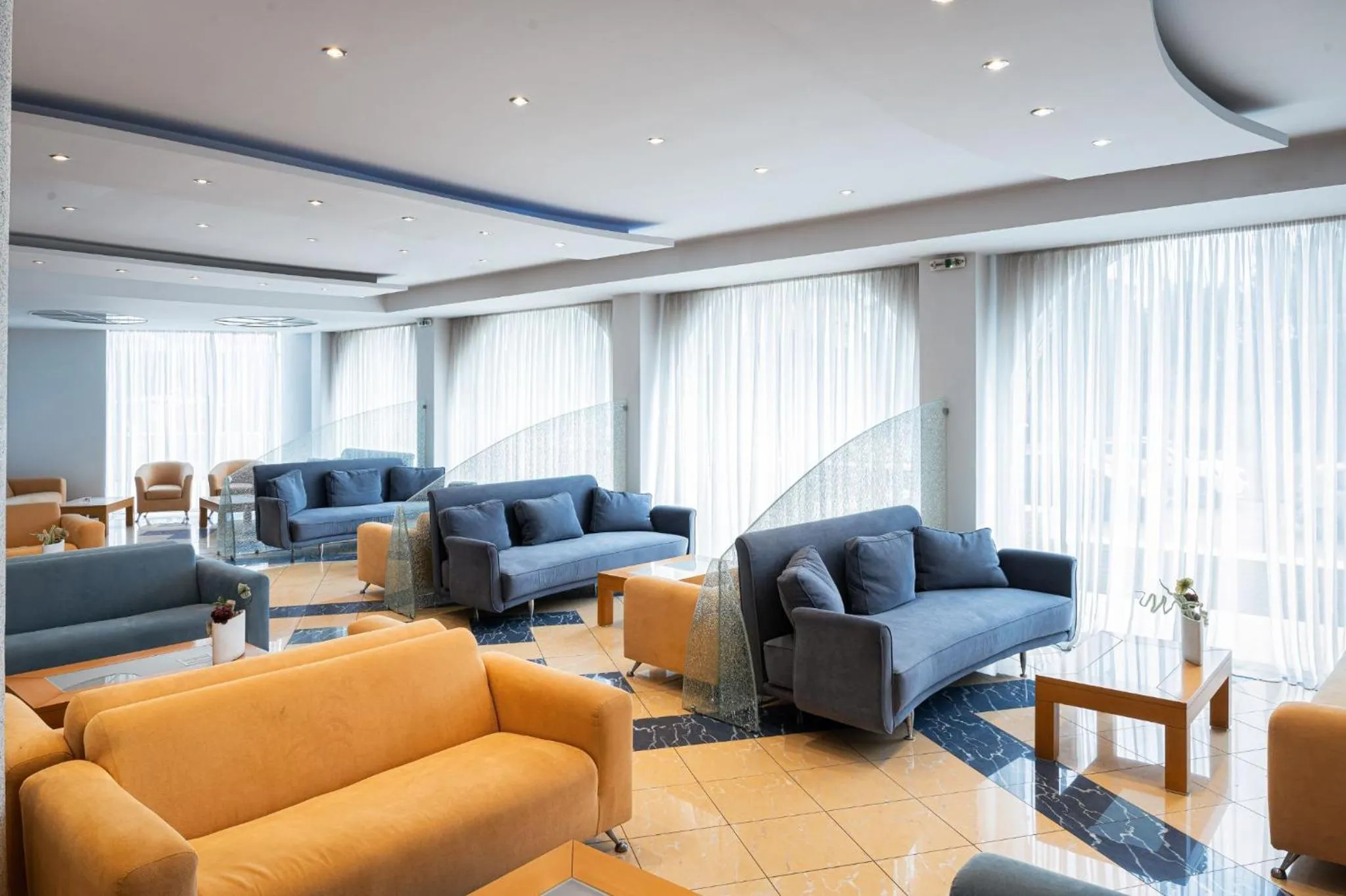 Communal lounge/ TV room in Kreoli Suites Glyfada