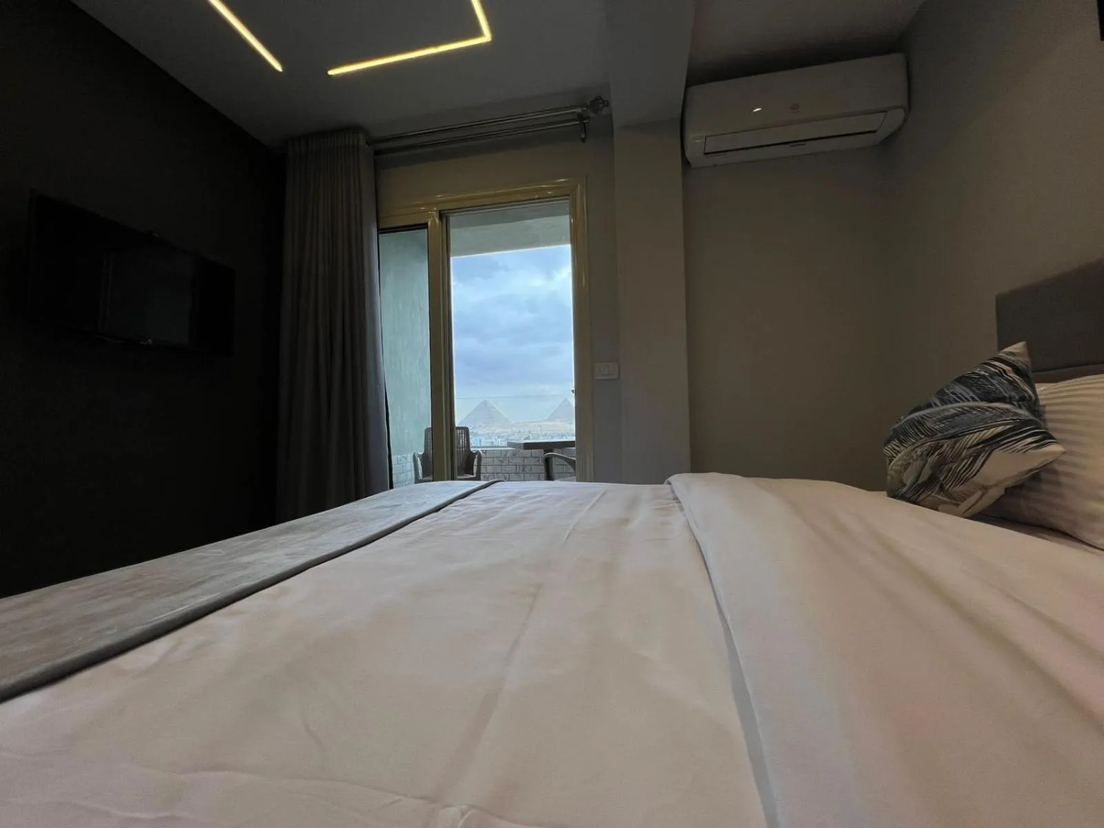 Bed in pyramids grand museum inn