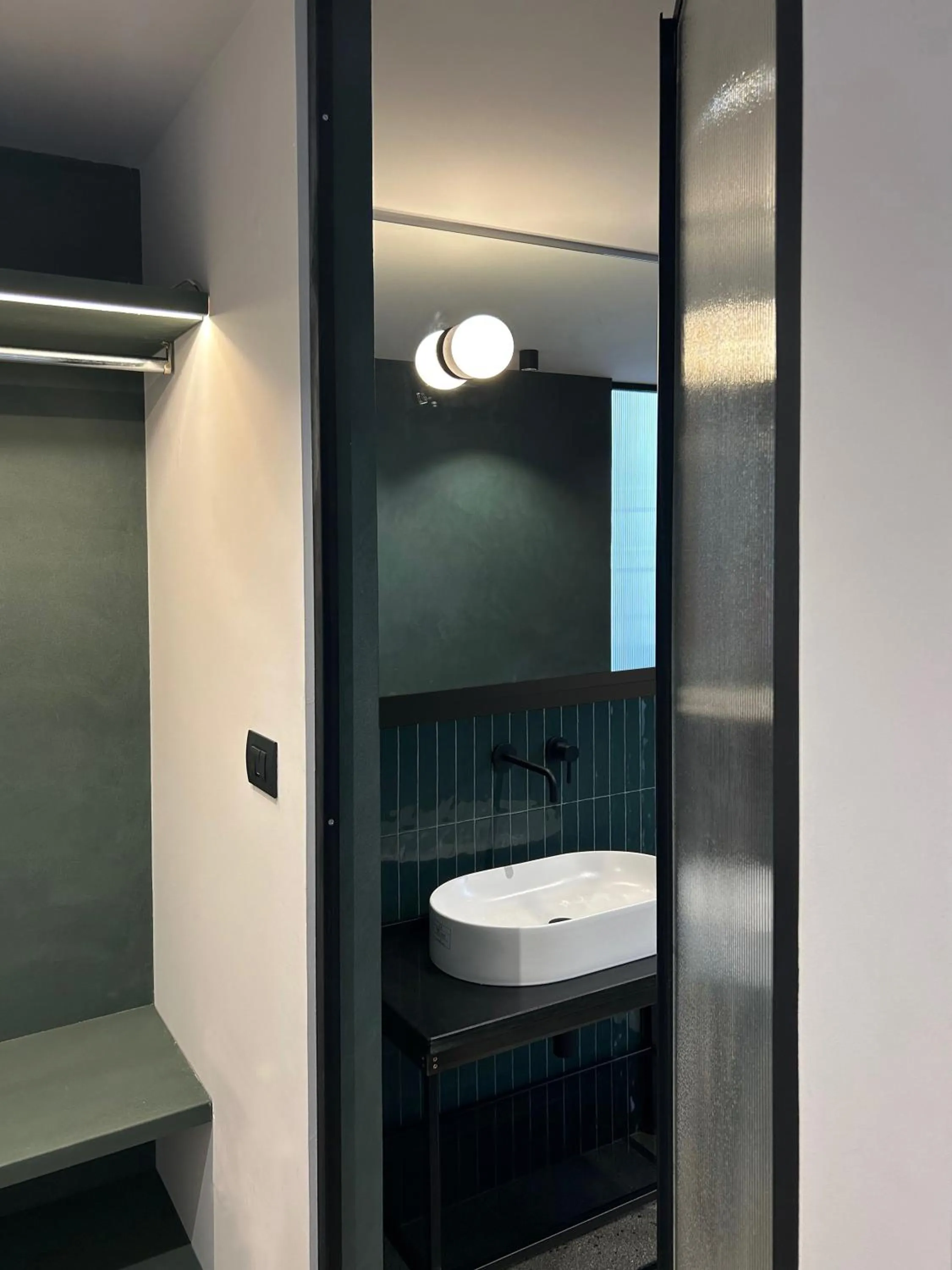 Bathroom in Roiss Haus Suites