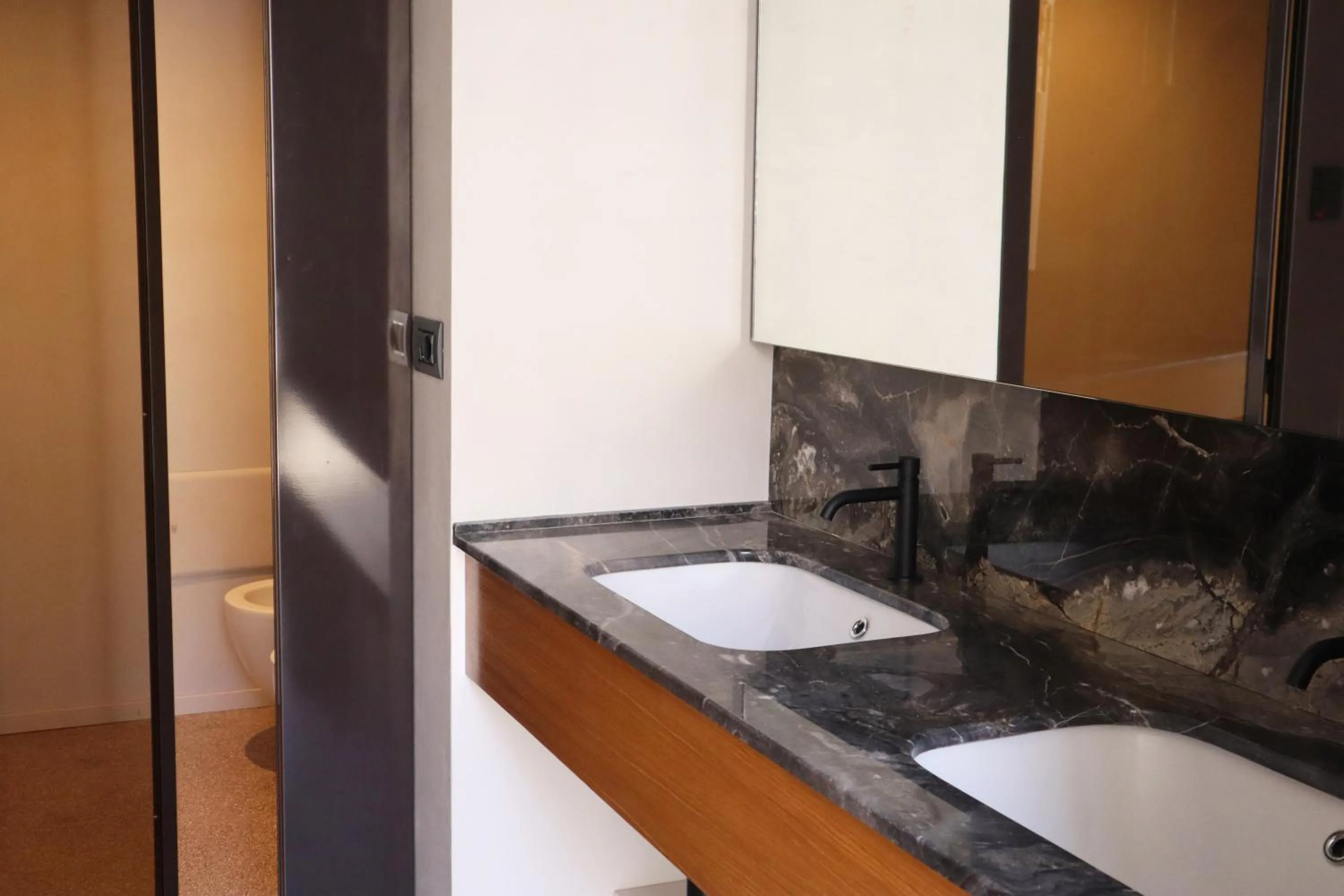 Bathroom in Roiss Haus Suites