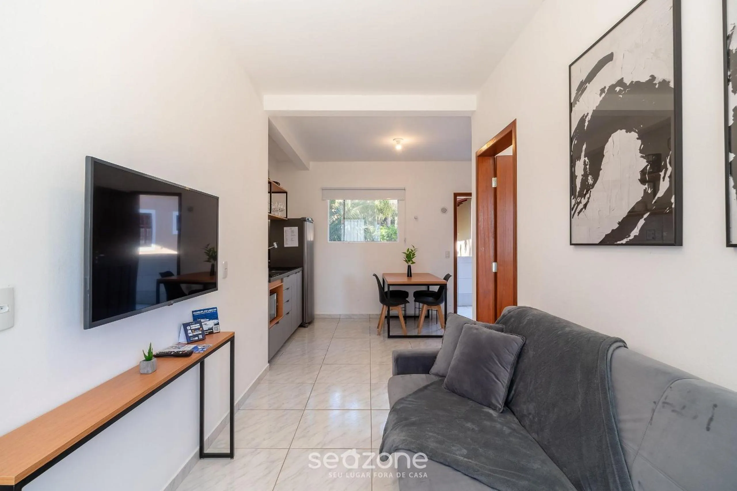 TV and multimedia in Apartamentos em Jurerê - JMA