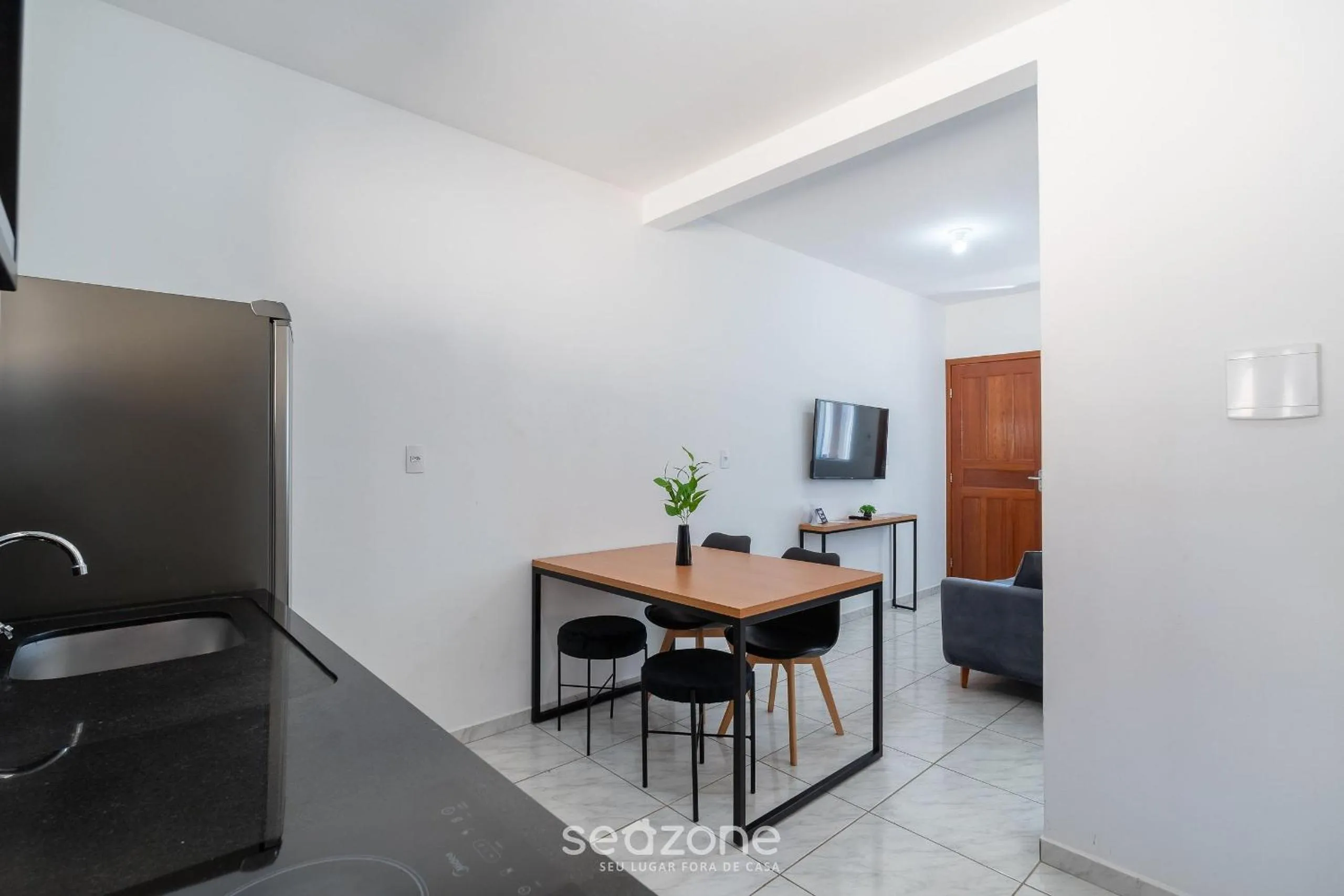 Kitchen or kitchenette in Apartamentos em Jurerê - JMA