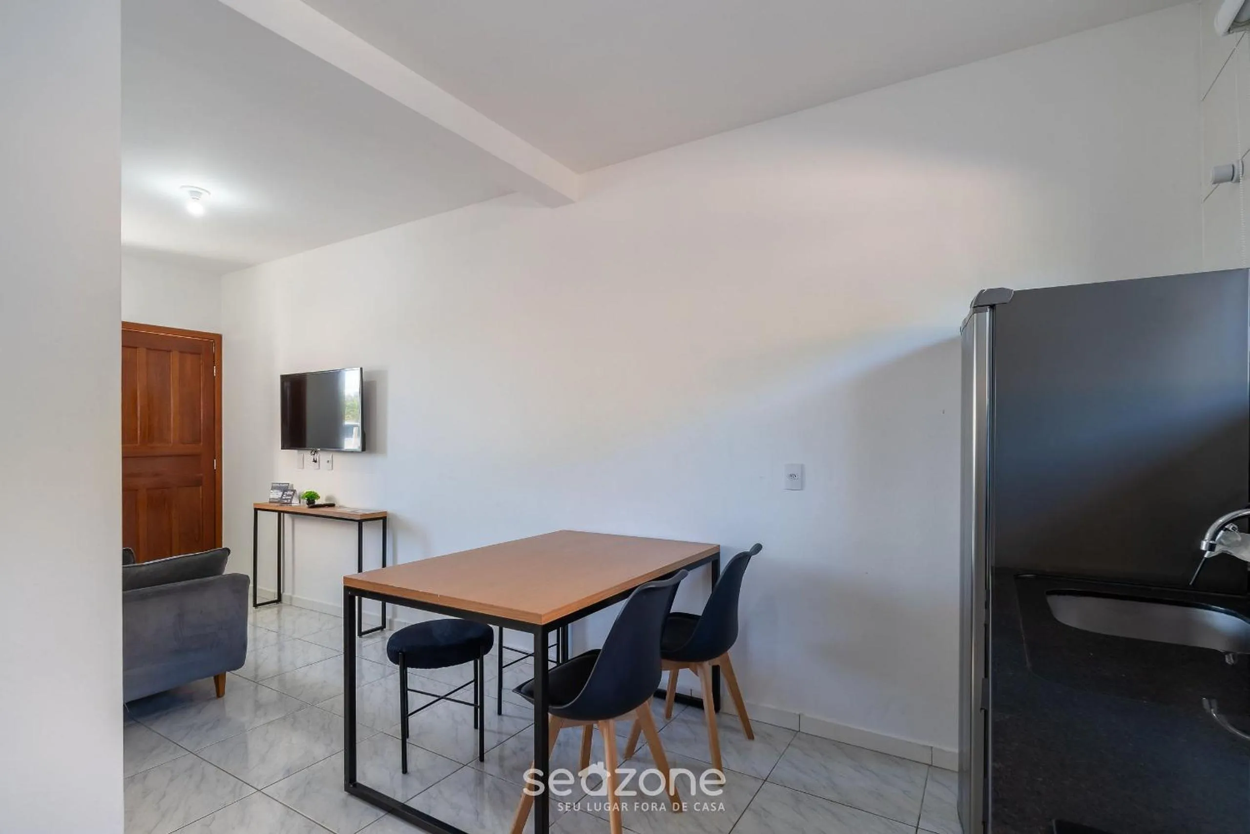 Kitchen or kitchenette in Apartamentos em Jurerê - JMA