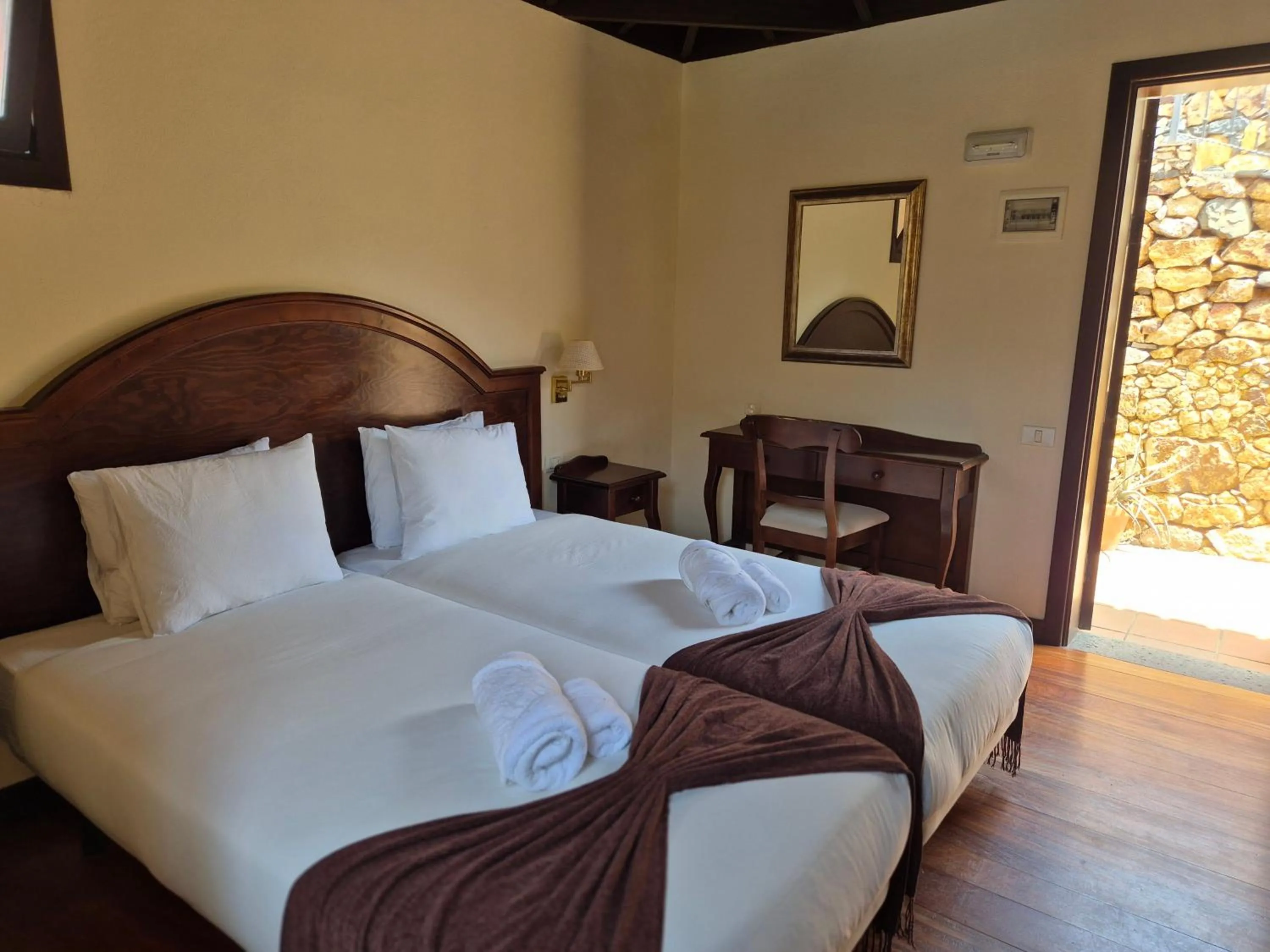 Bed in Tamahuche Hotel Rural