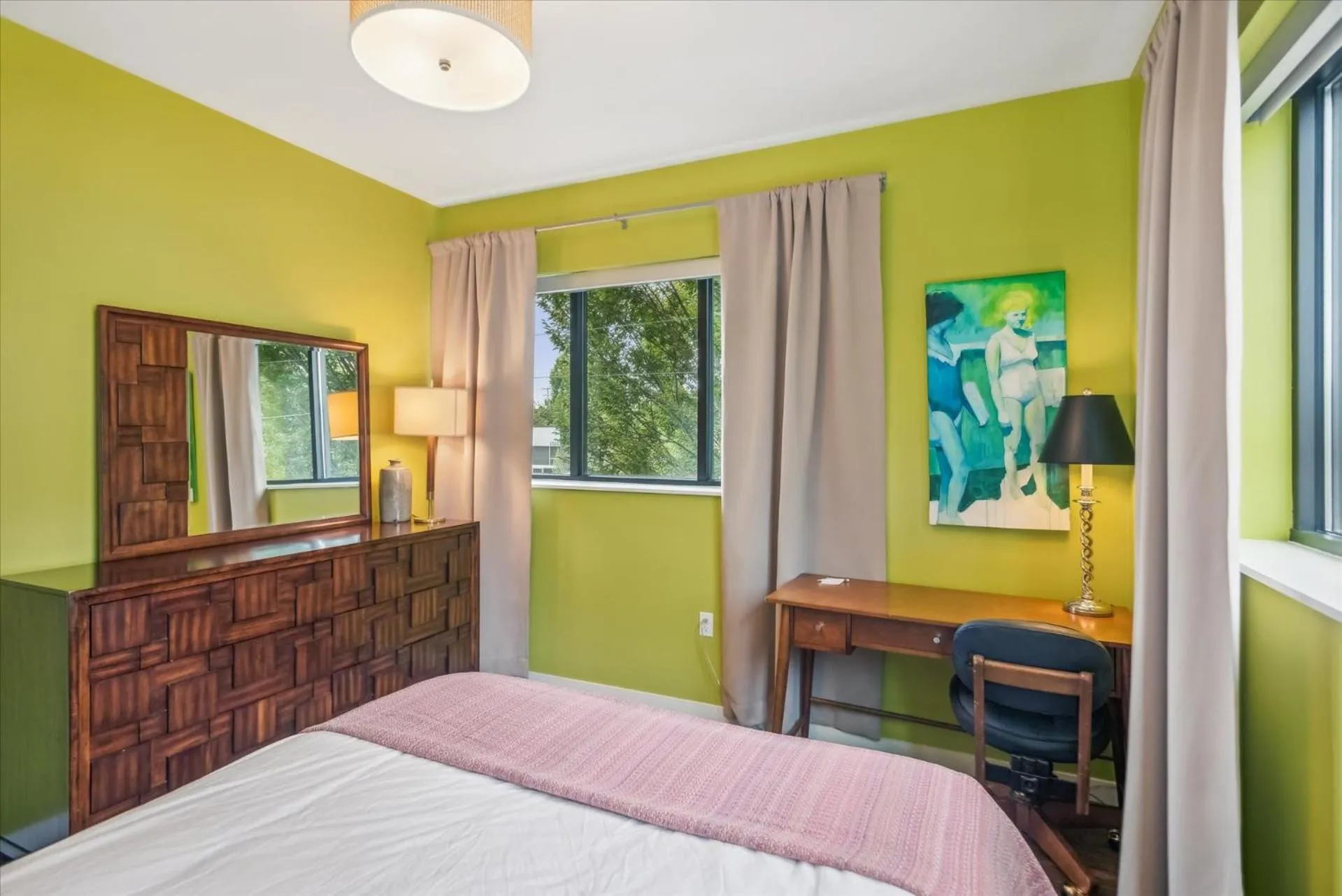 Bed in VioletSuitesPDX Boutique Hotel