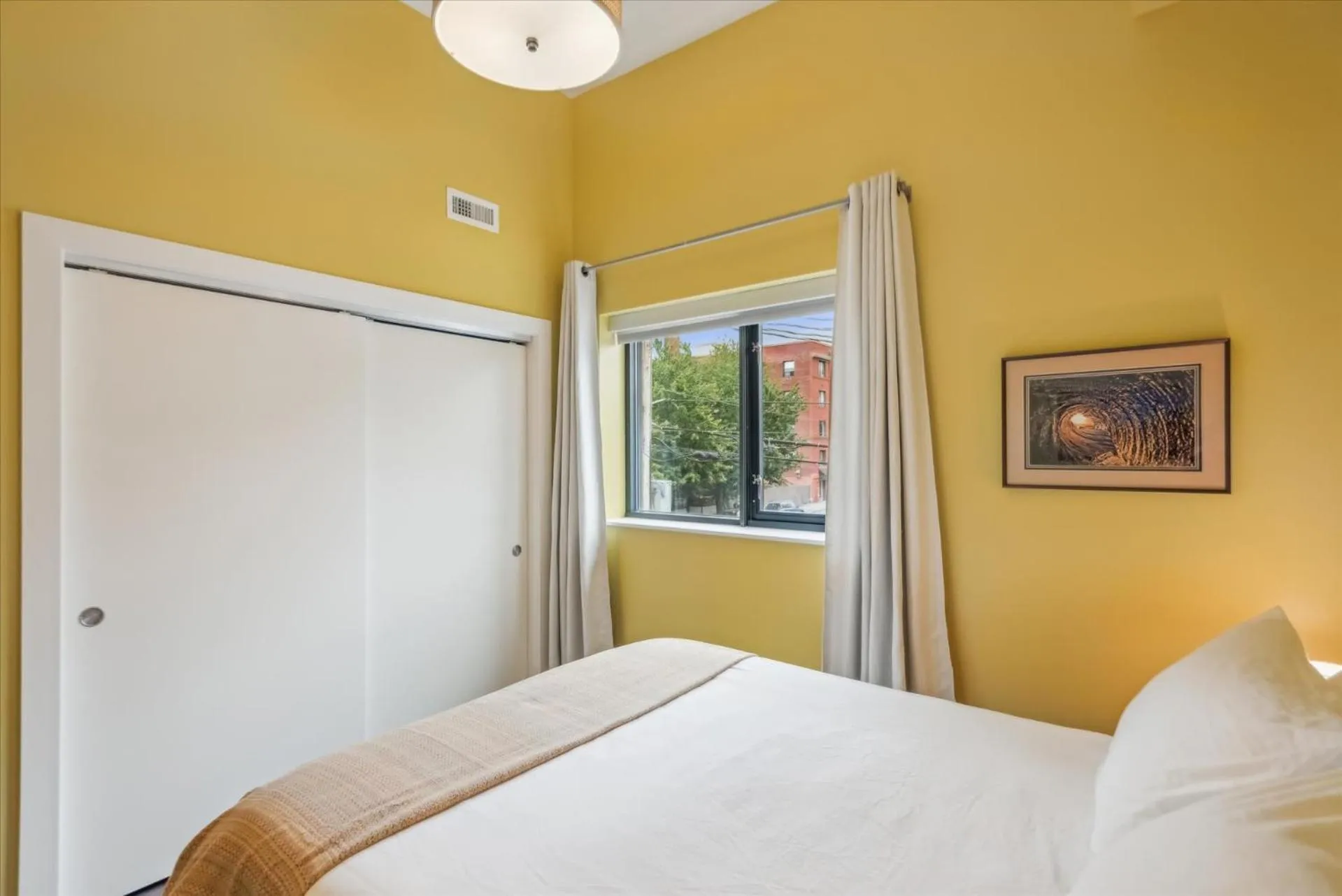 Bed in VioletSuitesPDX Boutique Hotel