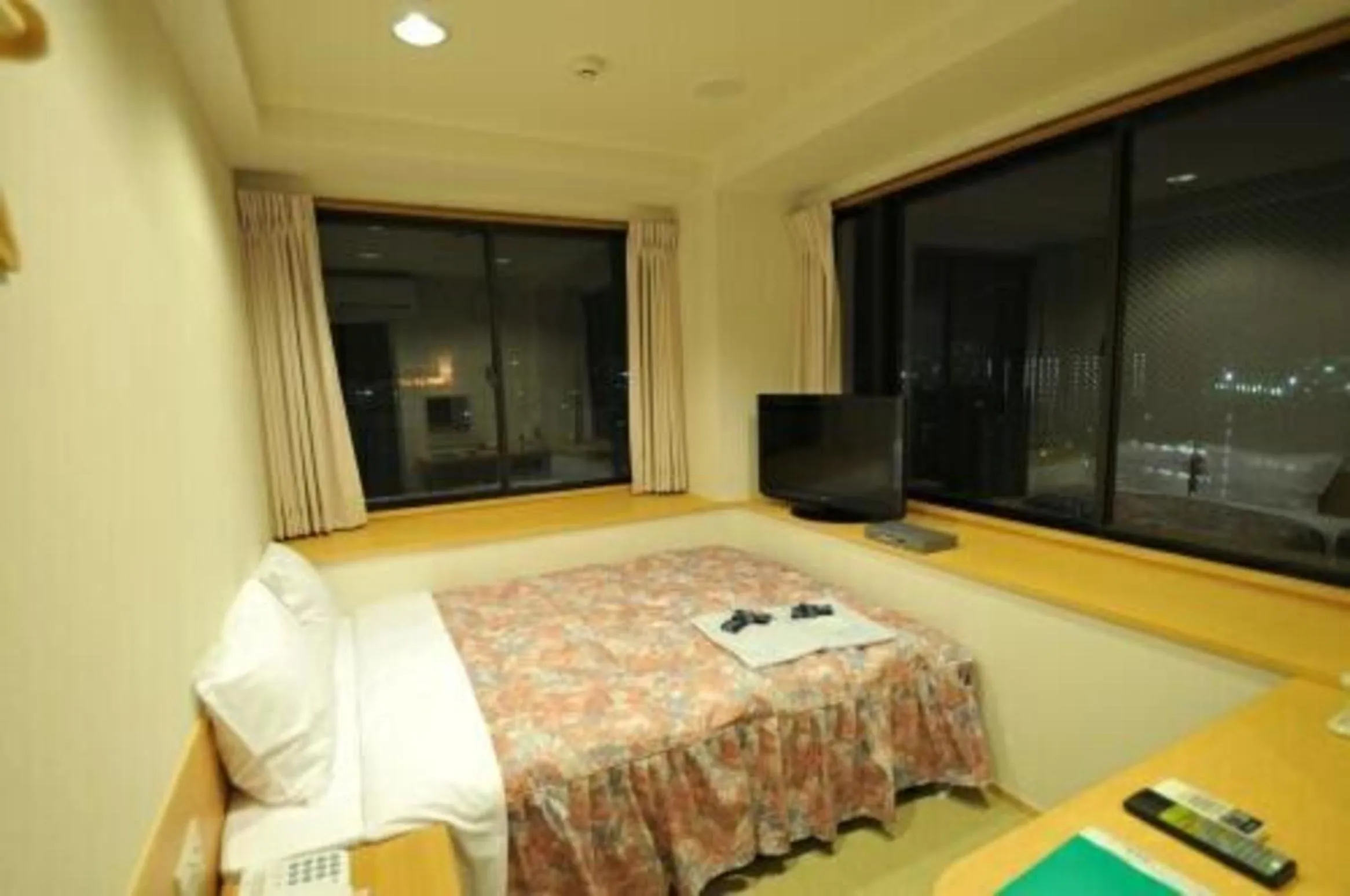Photo of the whole room, Bed in Hiroshima Ekimae Universal Hotel