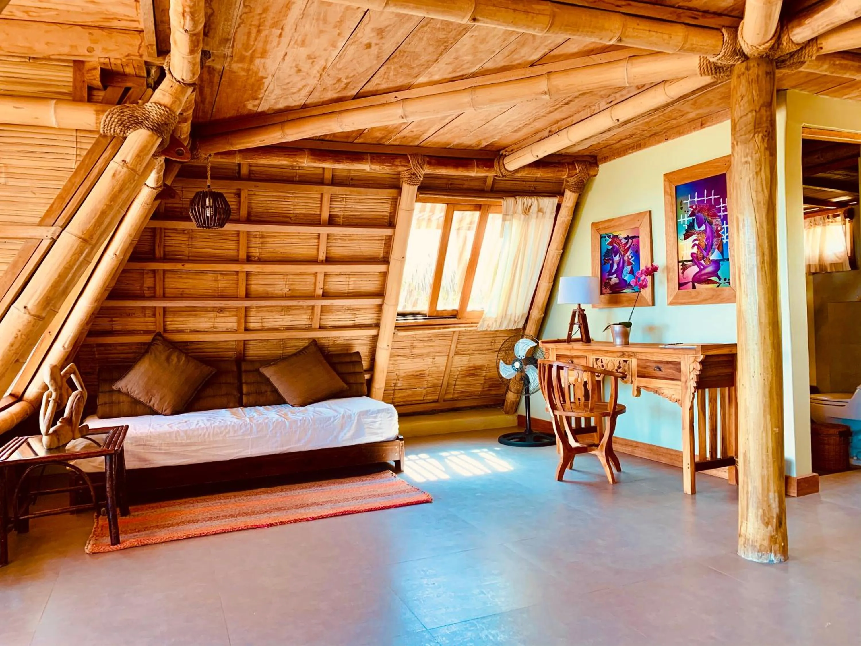 Seating area, Bed in La Playa