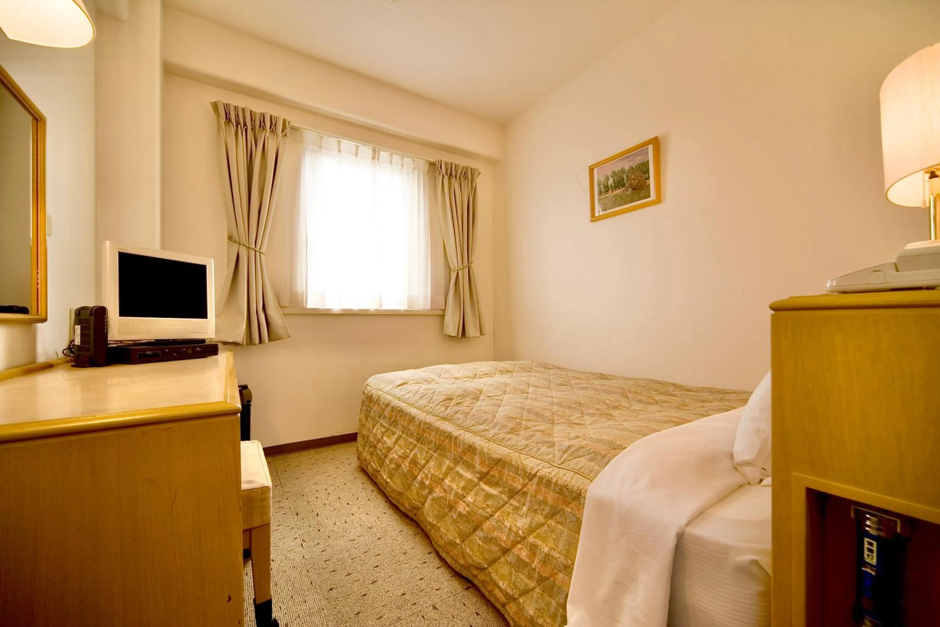 Photo of the whole room, Bed in Kurashiki Ekimae Universal Hotel