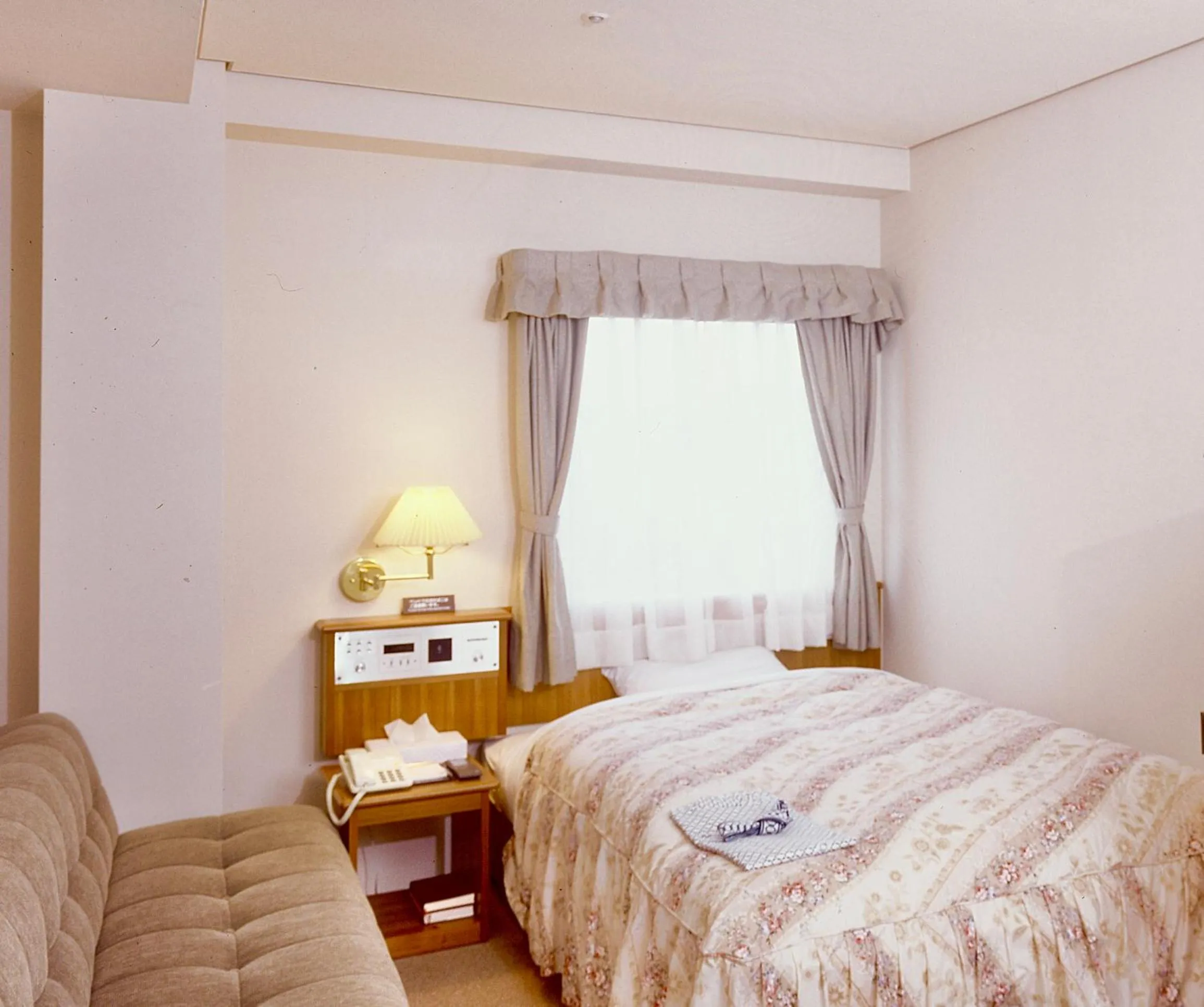 Photo of the whole room, Bed in Okayama Universal Hotel Annex