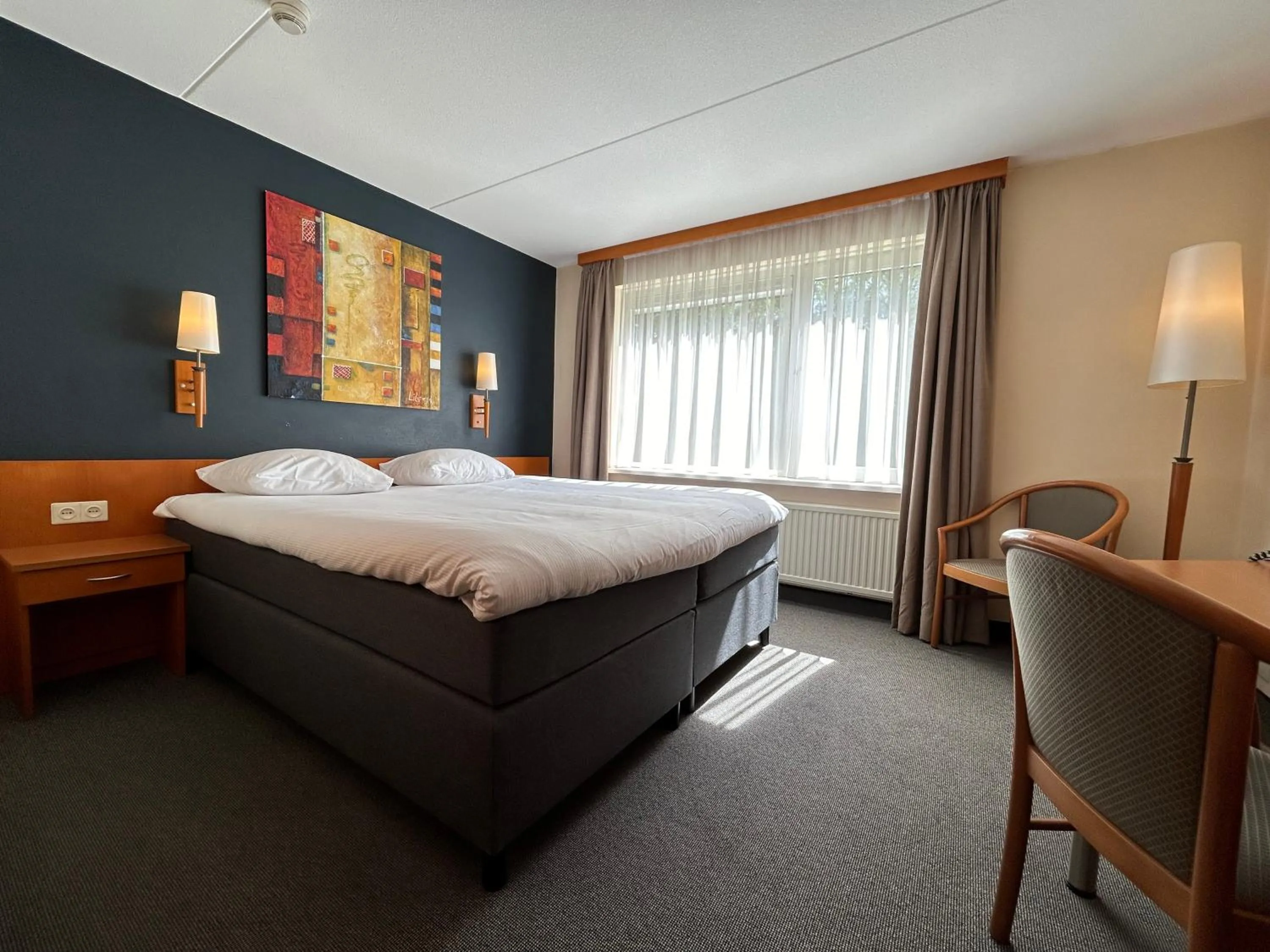 Property building, Bed in Hotel De Werelt Garderen