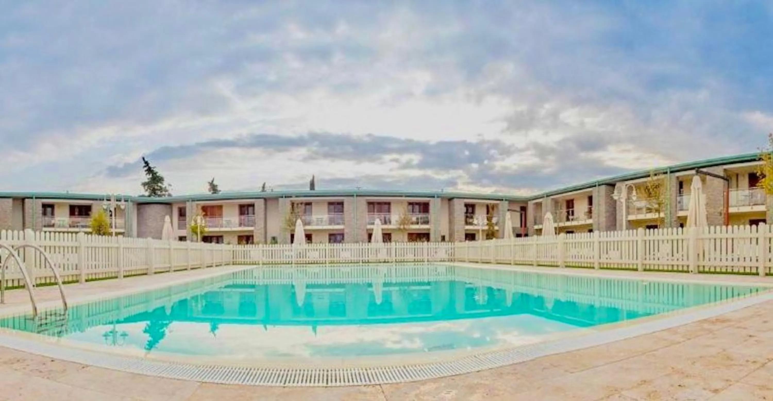 Swimming pool in ISA-Residence with swimming-pool in Barberino-Tavernelle, apartments with air conditioning and private outdoor area