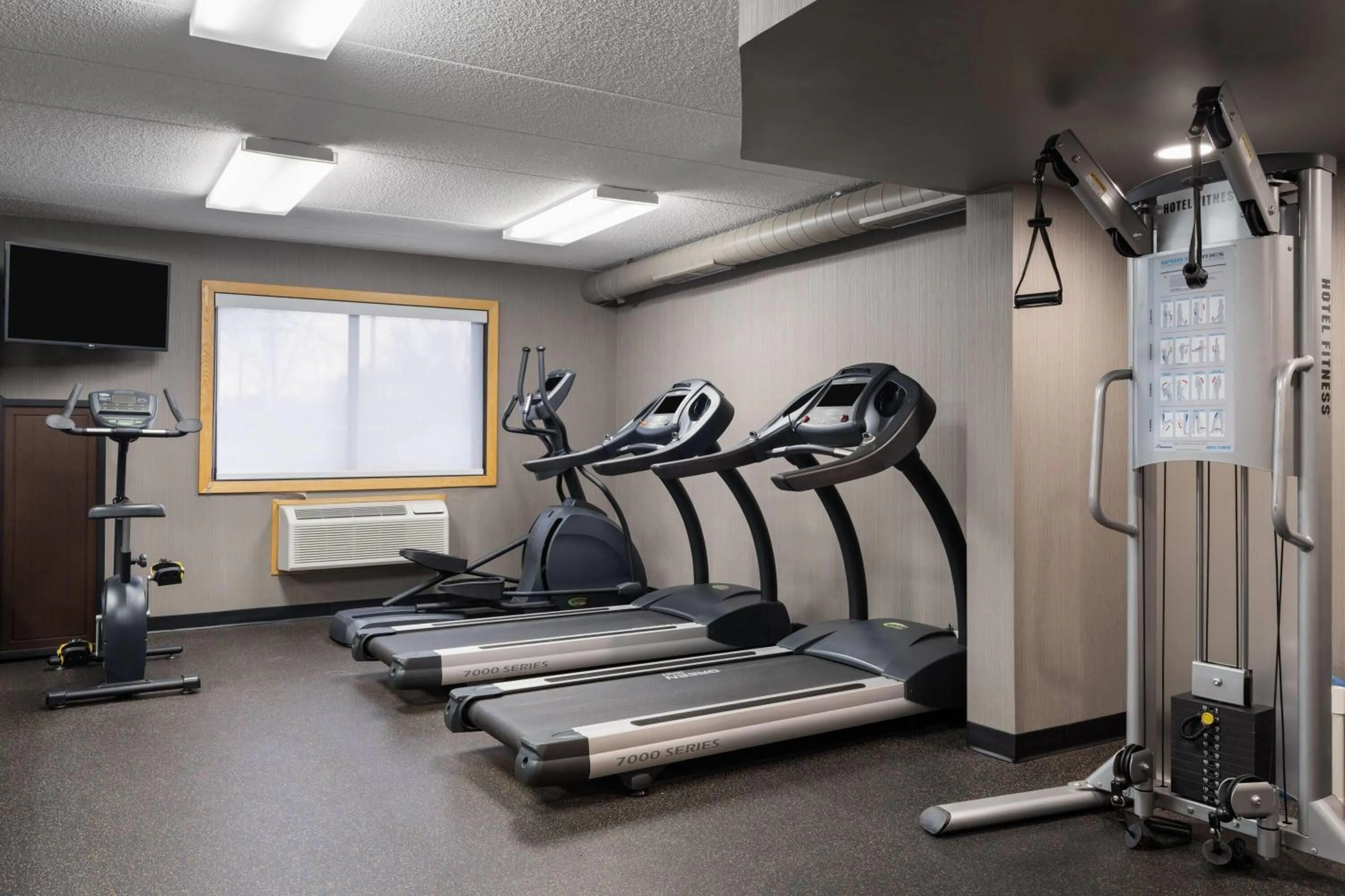 Fitness centre/facilities in AmericInn by Wyndham Grand Forks