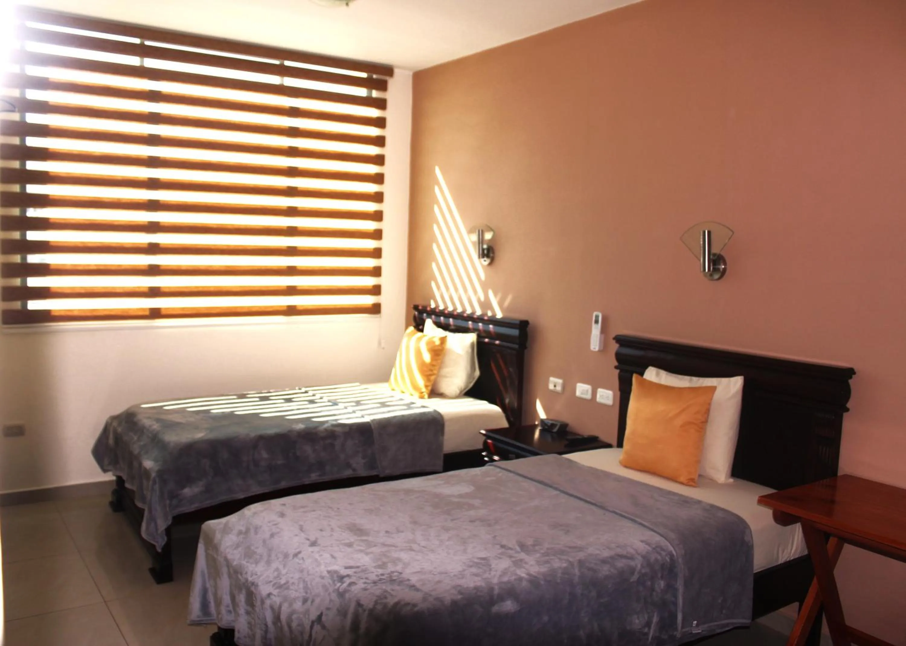 Bed in Hotel Flamingo