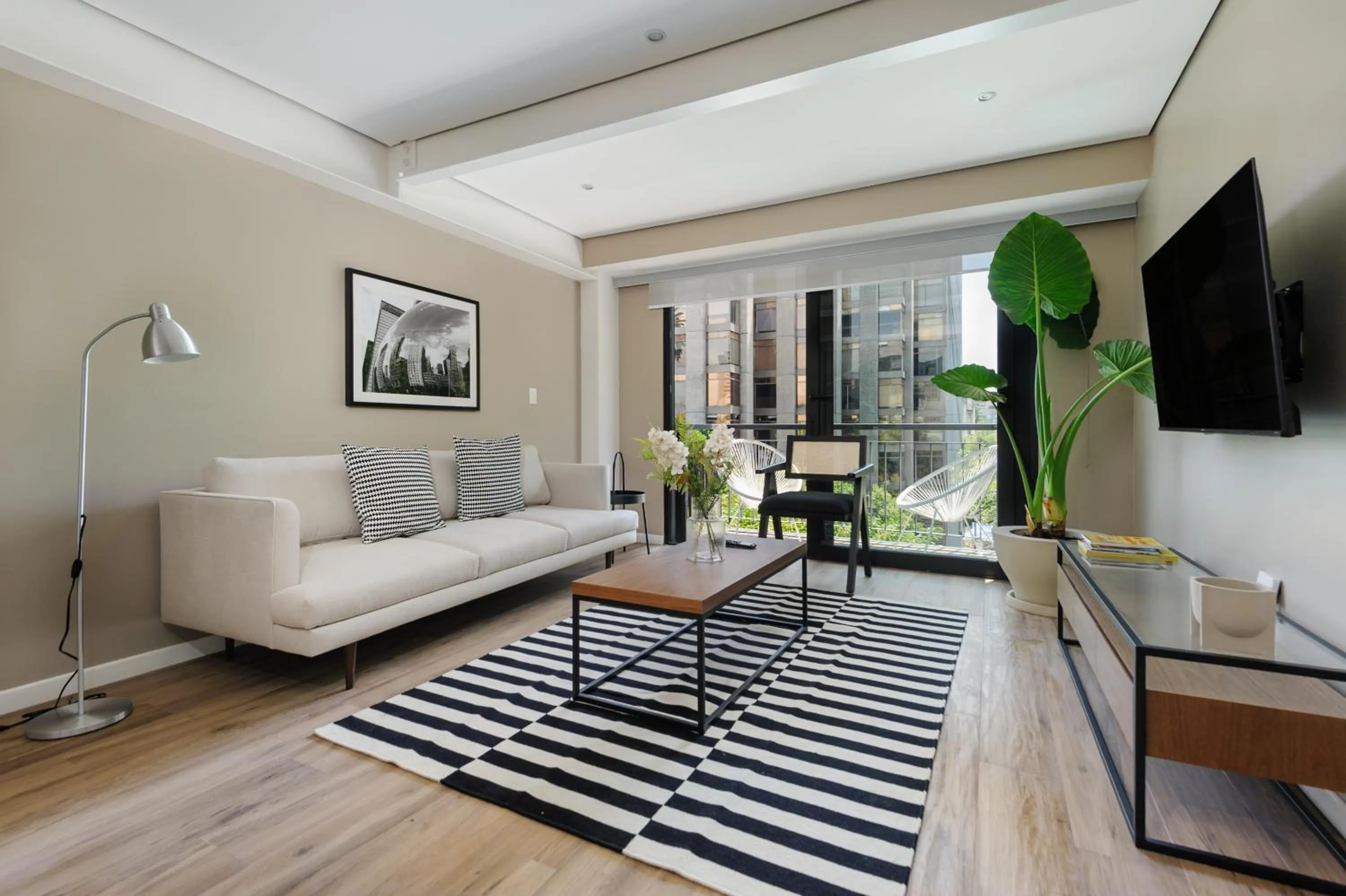 Living room in Nuevo Leon 155 by Wynwood House