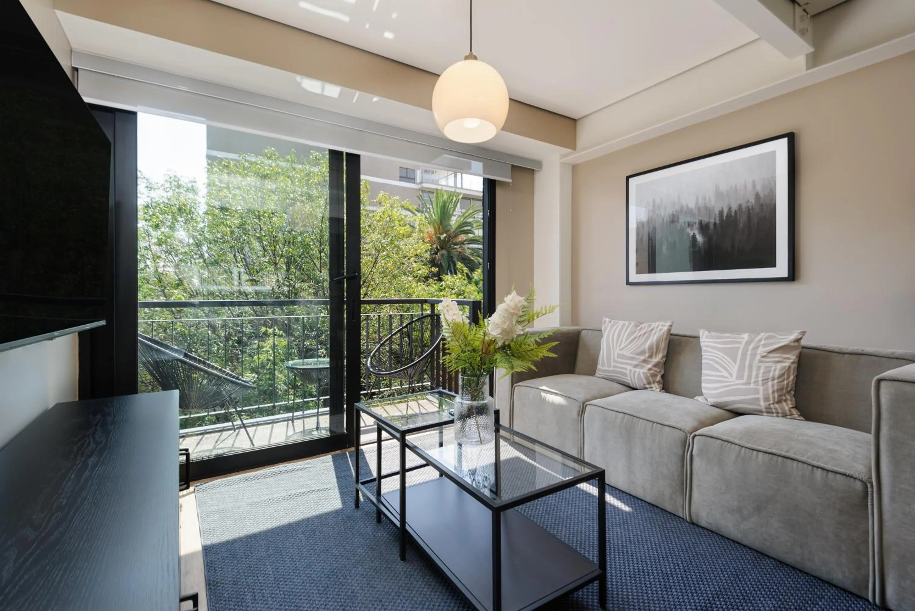 Living room in Nuevo Leon 155 by Wynwood House