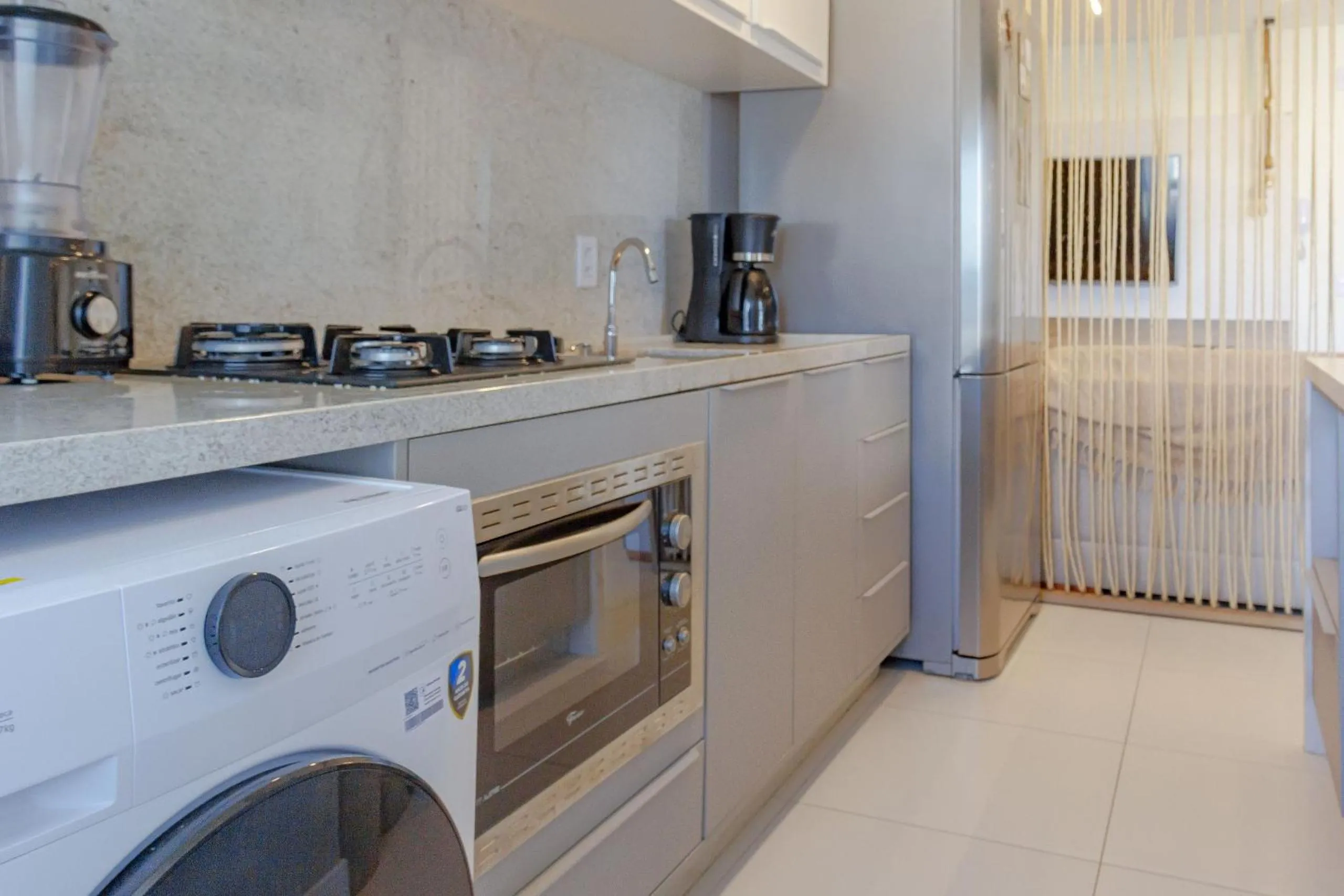 Kitchen or kitchenette in Venice Home Club - Balneário Piçarras