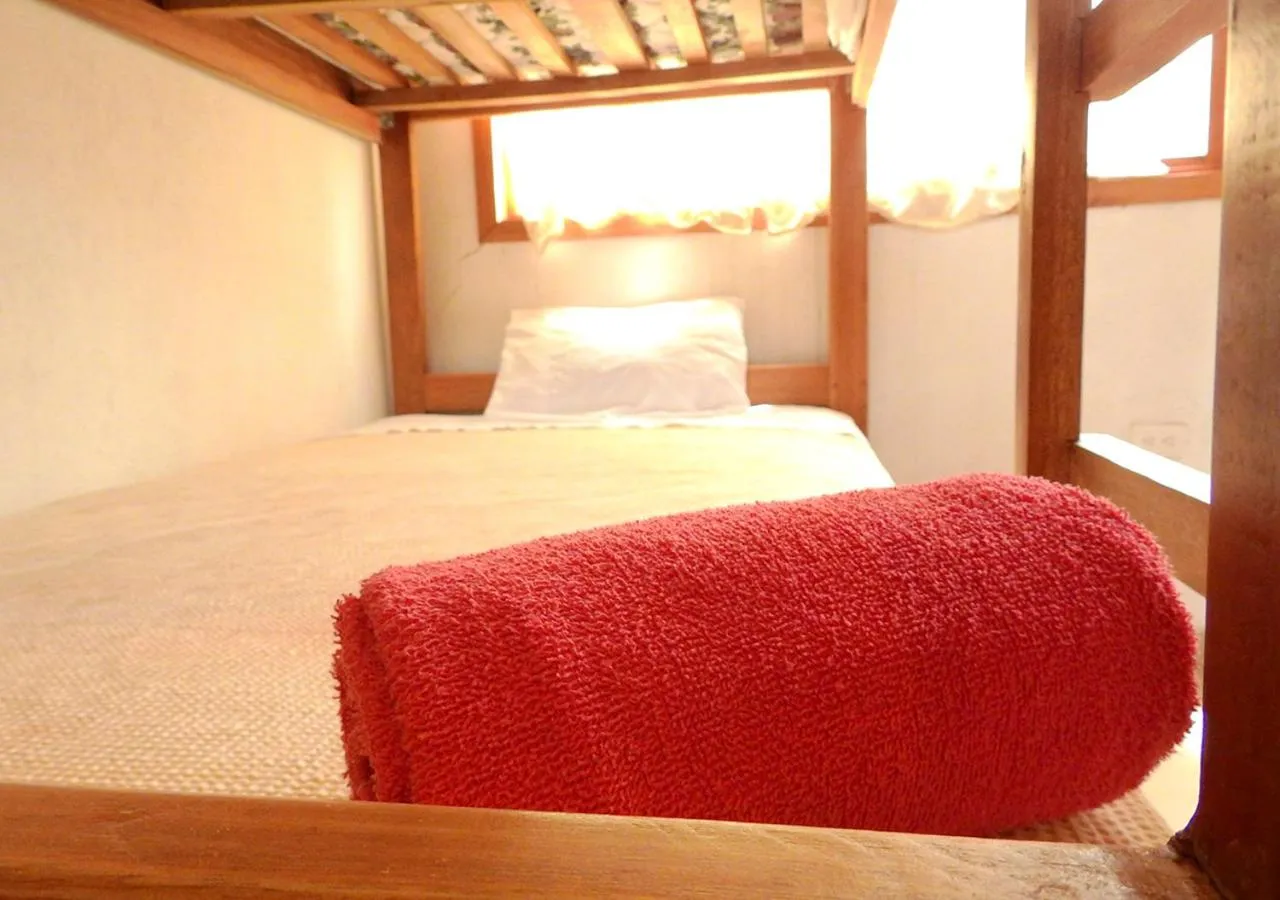 Bed in La Facha Hostal Restaurant Surf