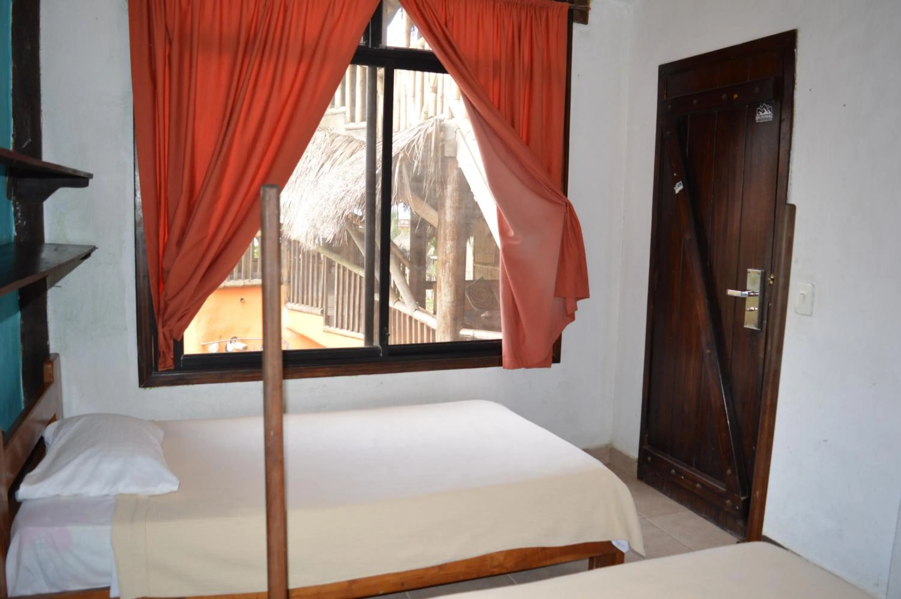 Photo of the whole room, Bed in La Facha Hostal Restaurant Surf