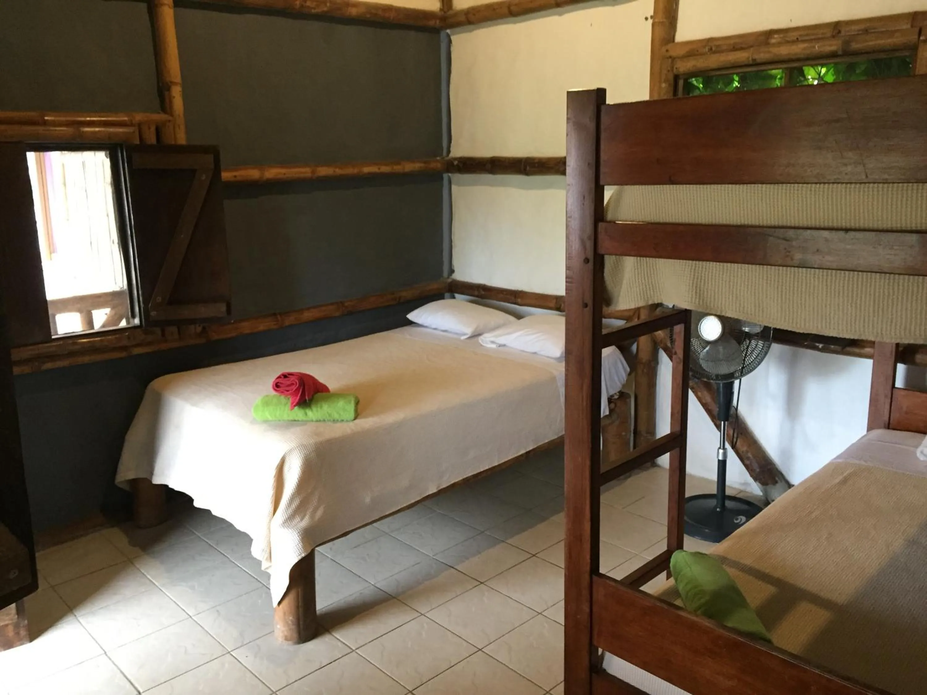 Photo of the whole room, Bed in La Facha Hostal Restaurant Surf