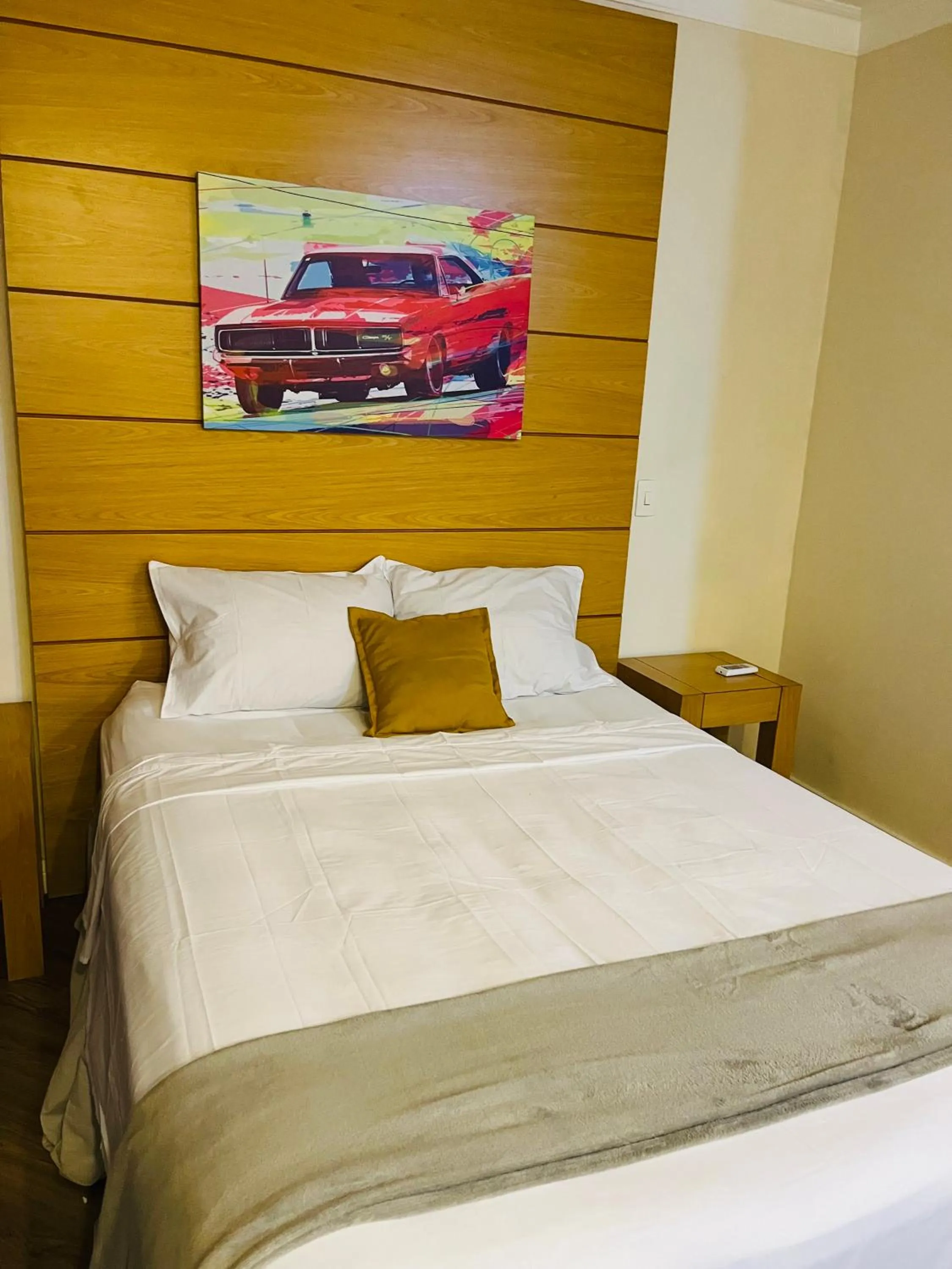 Bed in Quarto de hotel de luxo Congonhas