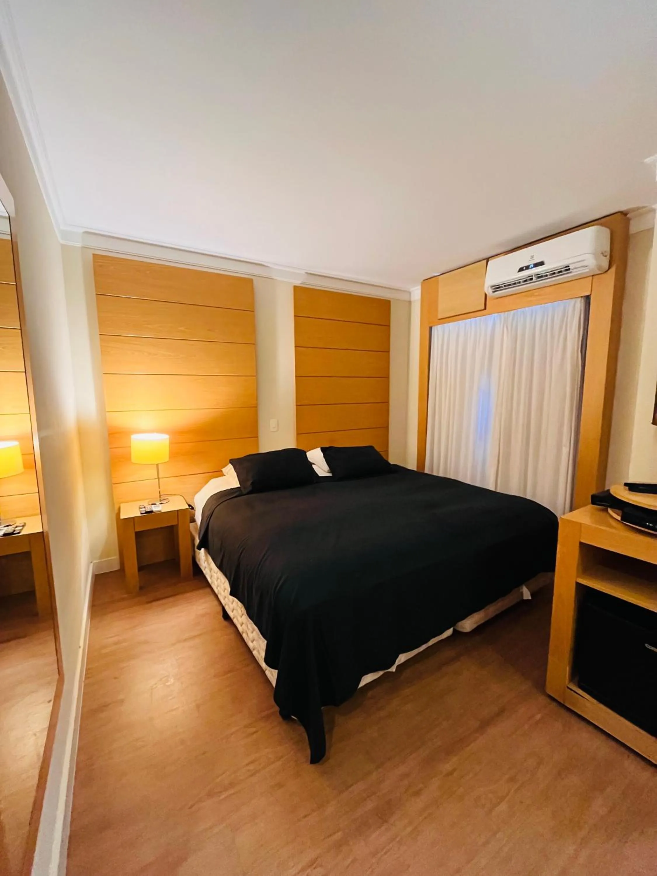 Bed in Quarto de hotel de luxo Congonhas