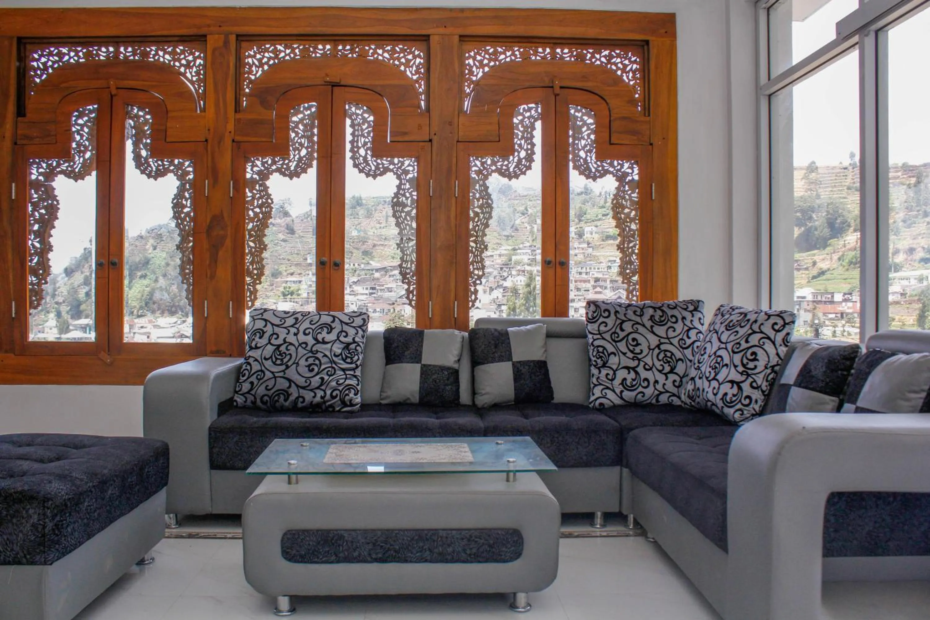 Living room in RedDoorz Syariah near Kawasan Wisata Gunung Prau Dieng